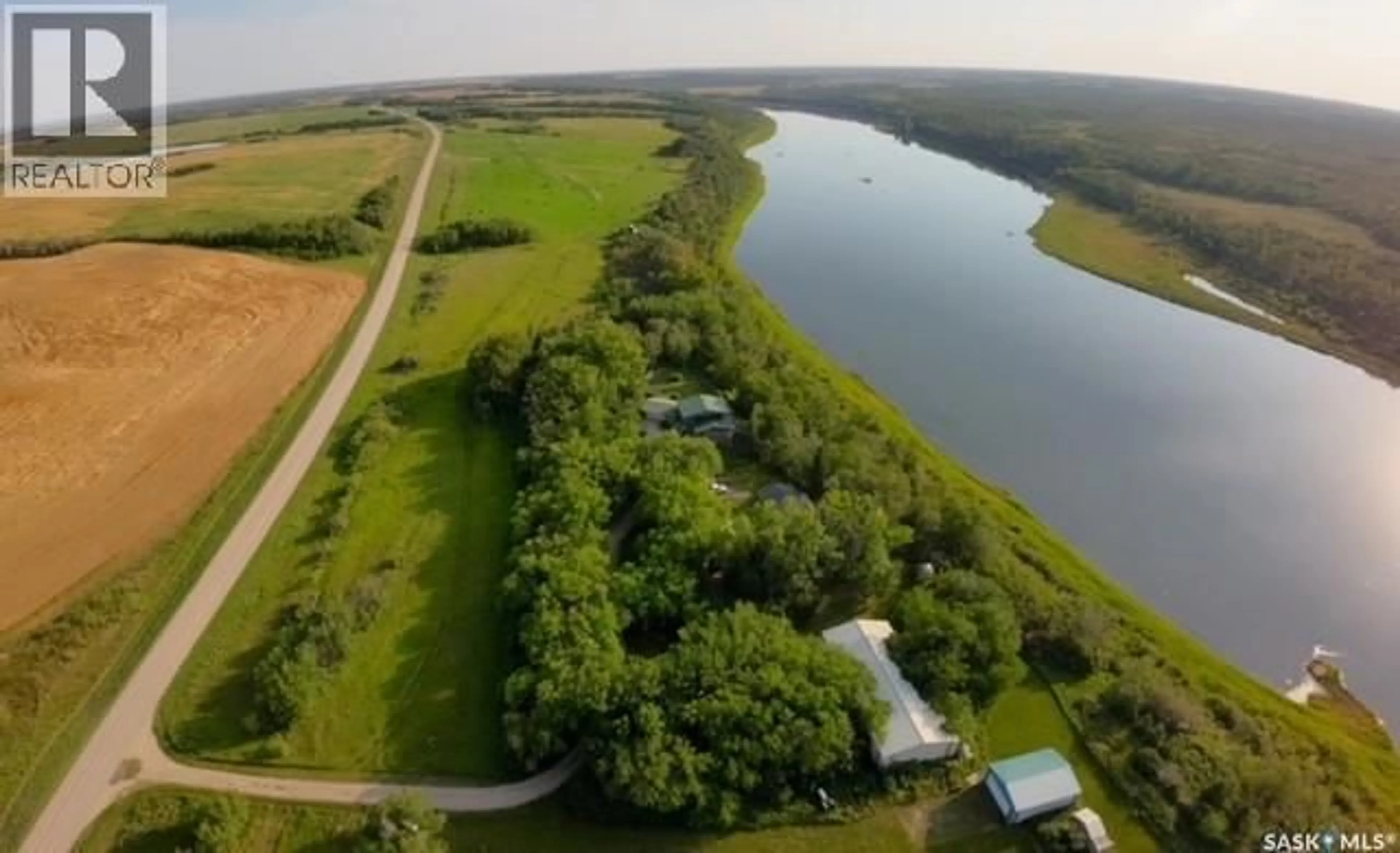 A pic from outside/outdoor area/front of a property/back of a property/a pic from drone, water/lake/river/ocean view for DERKSEN RIVERFRONT ACREAGE, St. Louis RM No. 431 Saskatchewan S0K4P0