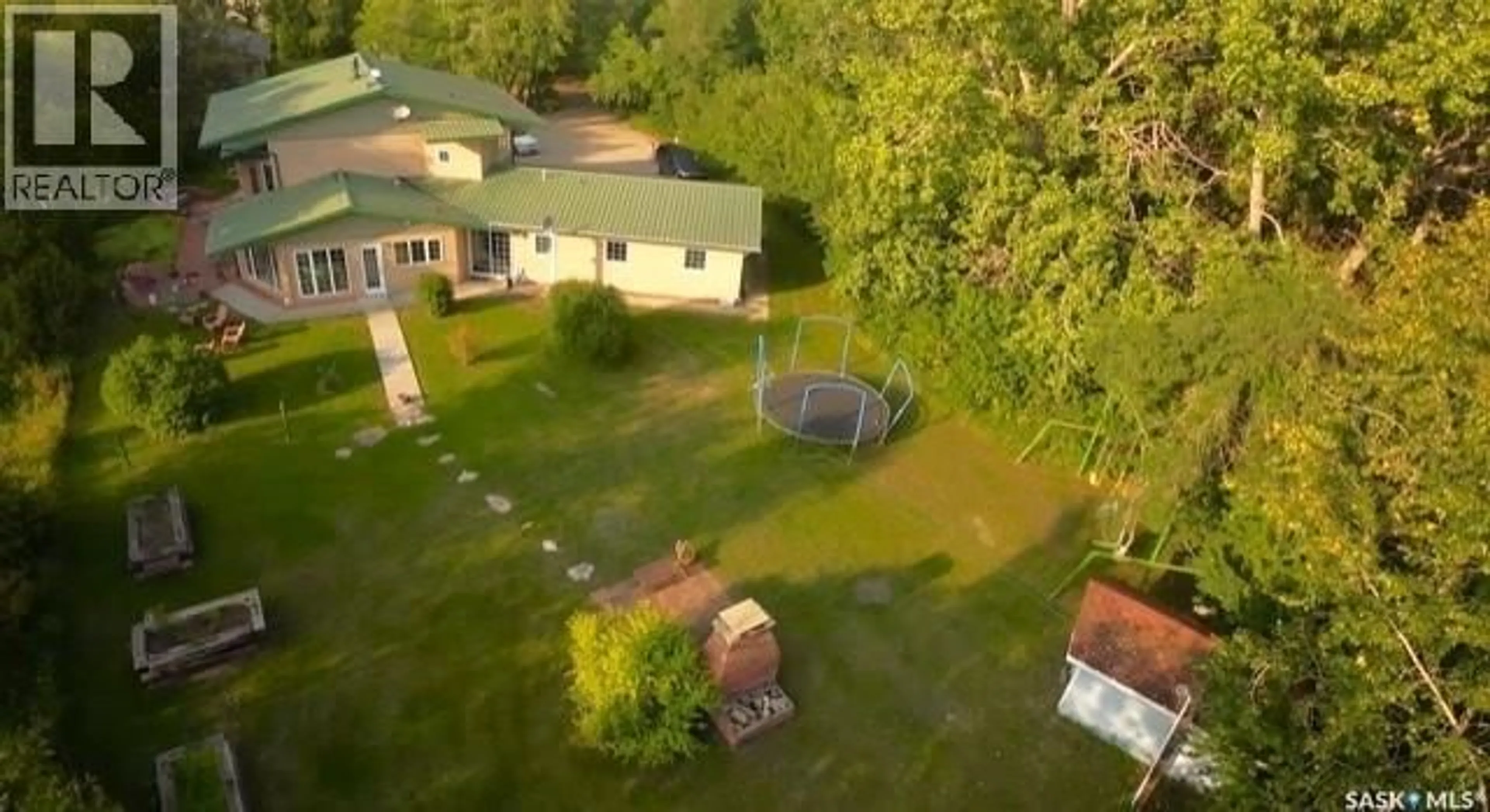 A pic from outside/outdoor area/front of a property/back of a property/a pic from drone, unknown for DERKSEN RIVERFRONT ACREAGE, St. Louis RM No. 431 Saskatchewan S0K4P0