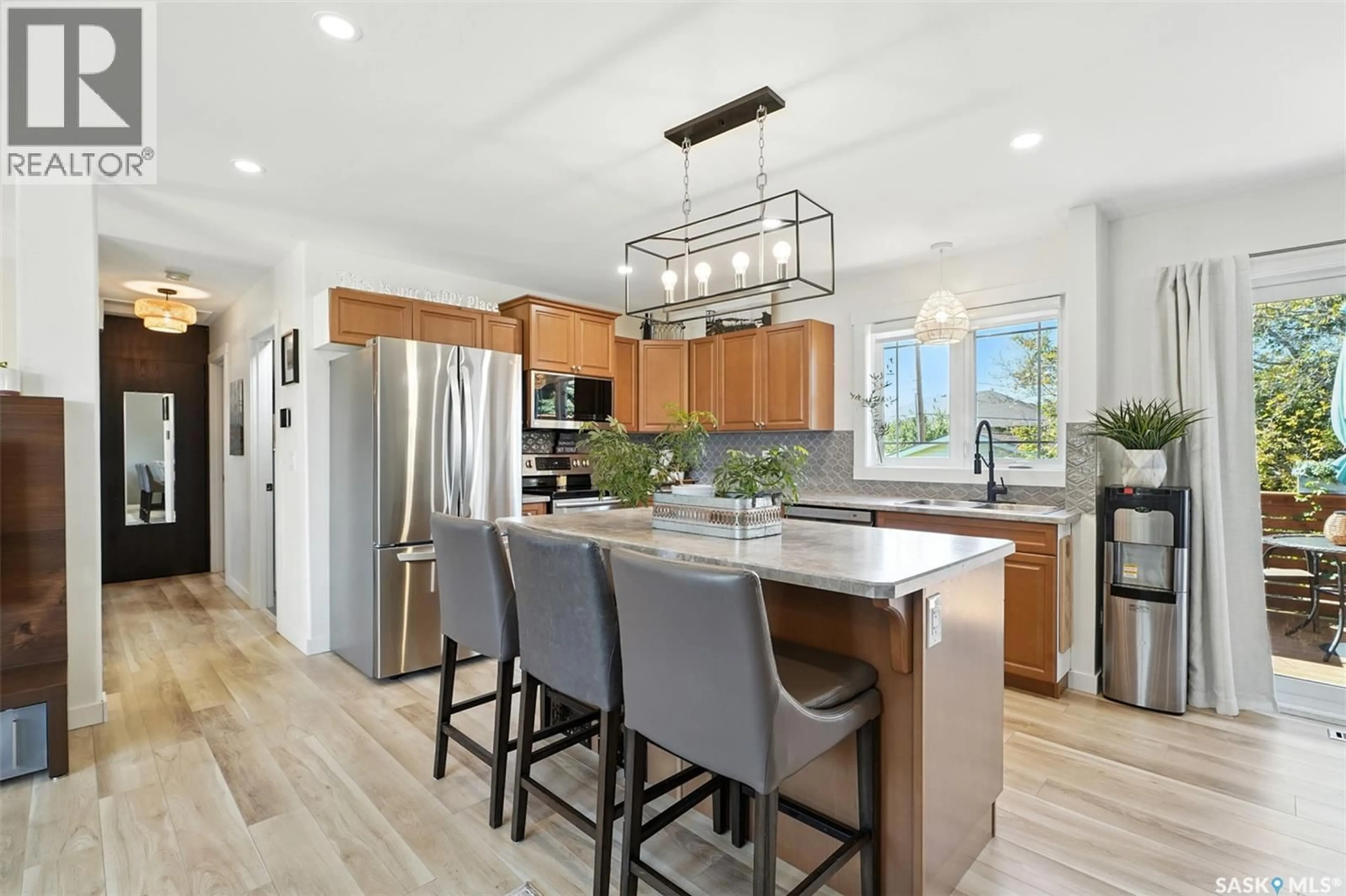 Open concept kitchen, ceramic/tile floor for 229 2ND STREET, Vanscoy Saskatchewan S0L3J0