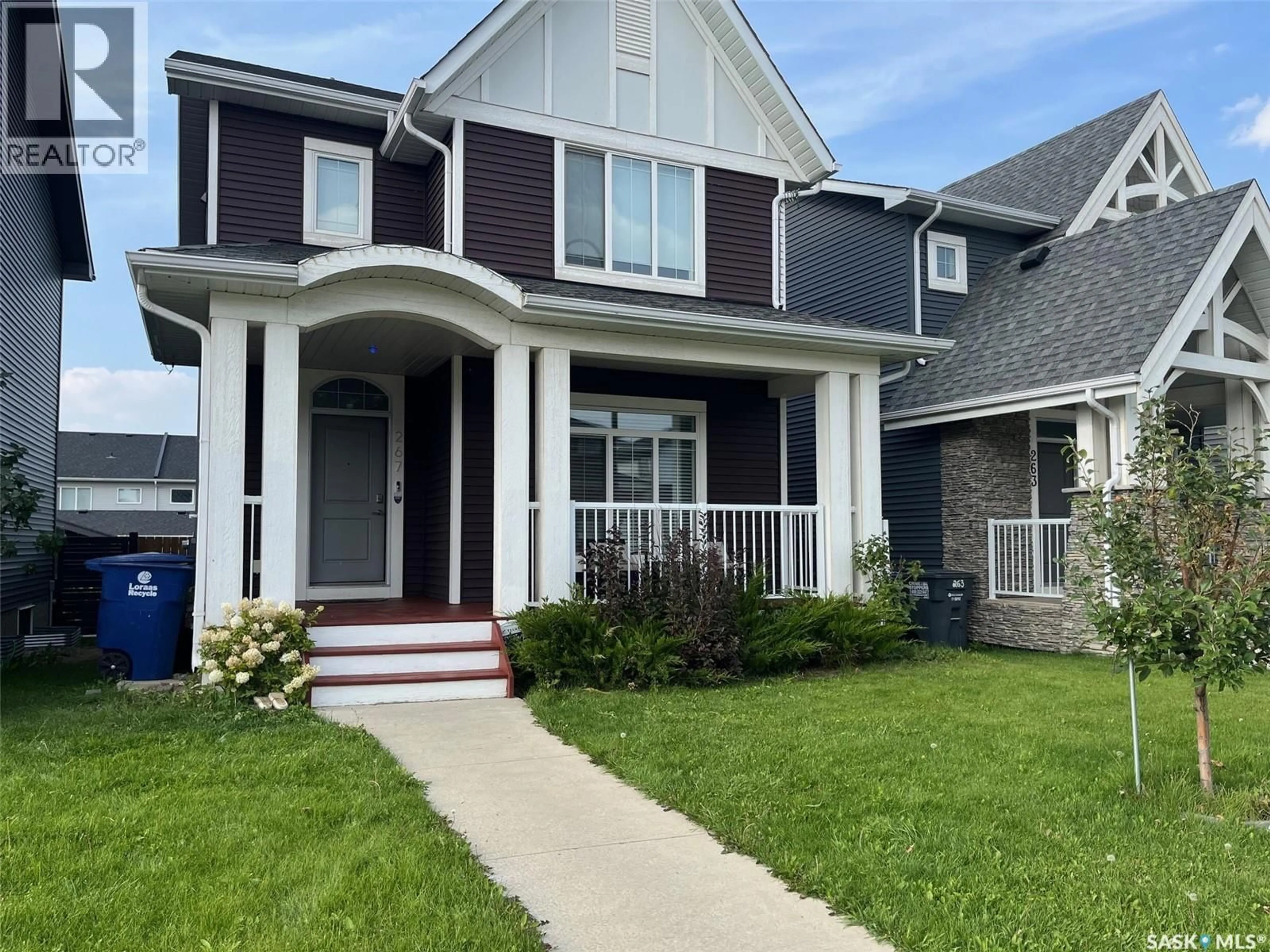 Home with vinyl exterior material, street for 267 NEWTON LINK, Saskatoon Saskatchewan S7V0M8