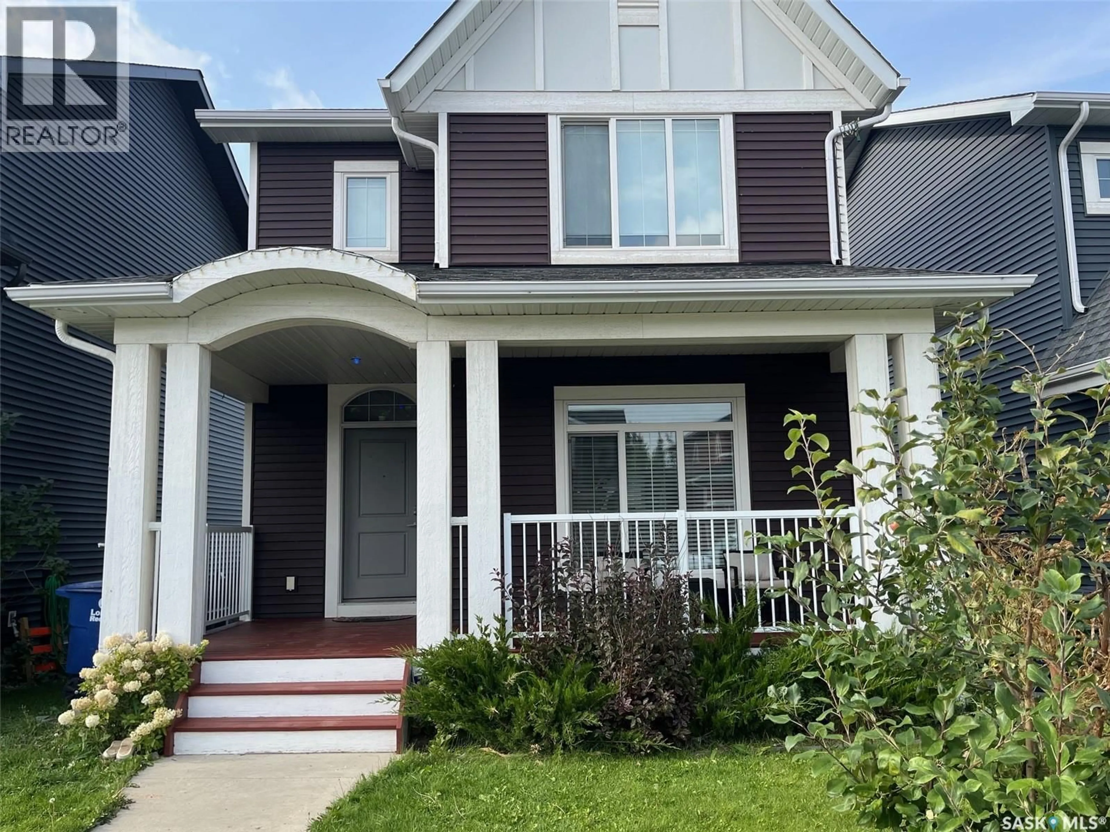 Home with vinyl exterior material, street for 267 NEWTON LINK, Saskatoon Saskatchewan S7V0M8