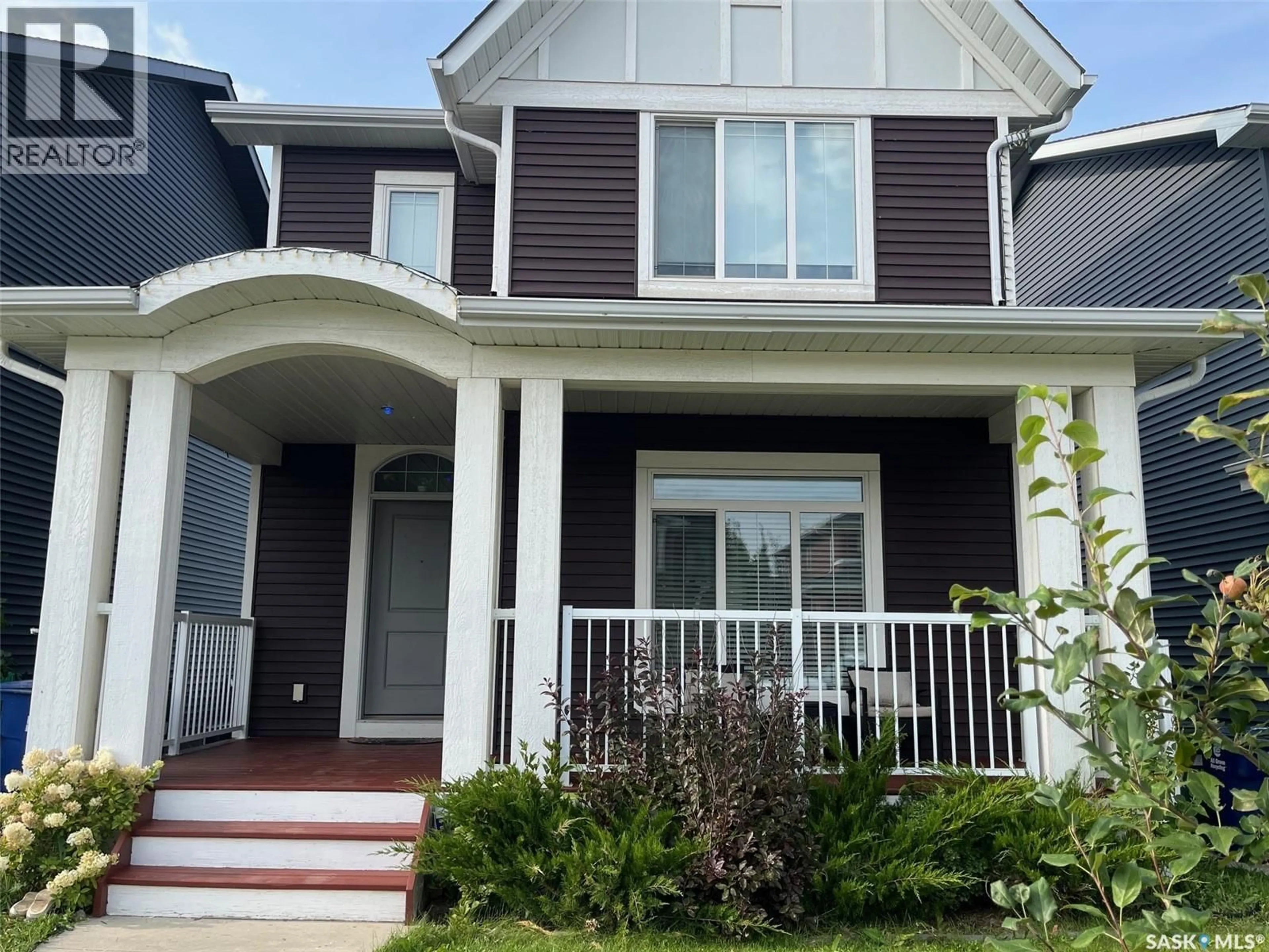 Home with vinyl exterior material, street for 267 NEWTON LINK, Saskatoon Saskatchewan S7V0M8