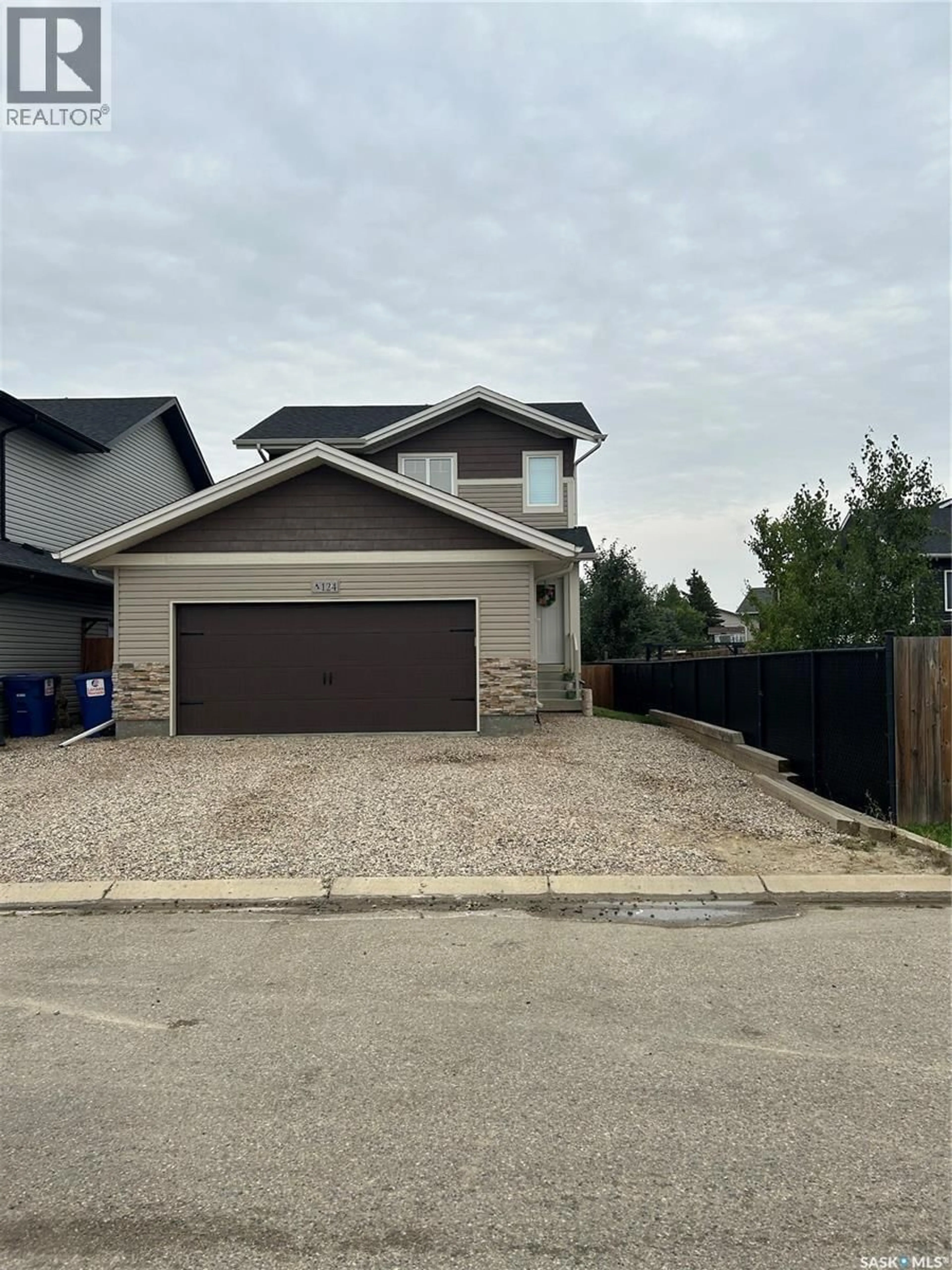 A pic from outside/outdoor area/front of a property/back of a property/a pic from drone, street for 124 PARKVIEW COVE, Osler Saskatchewan S0K3A0