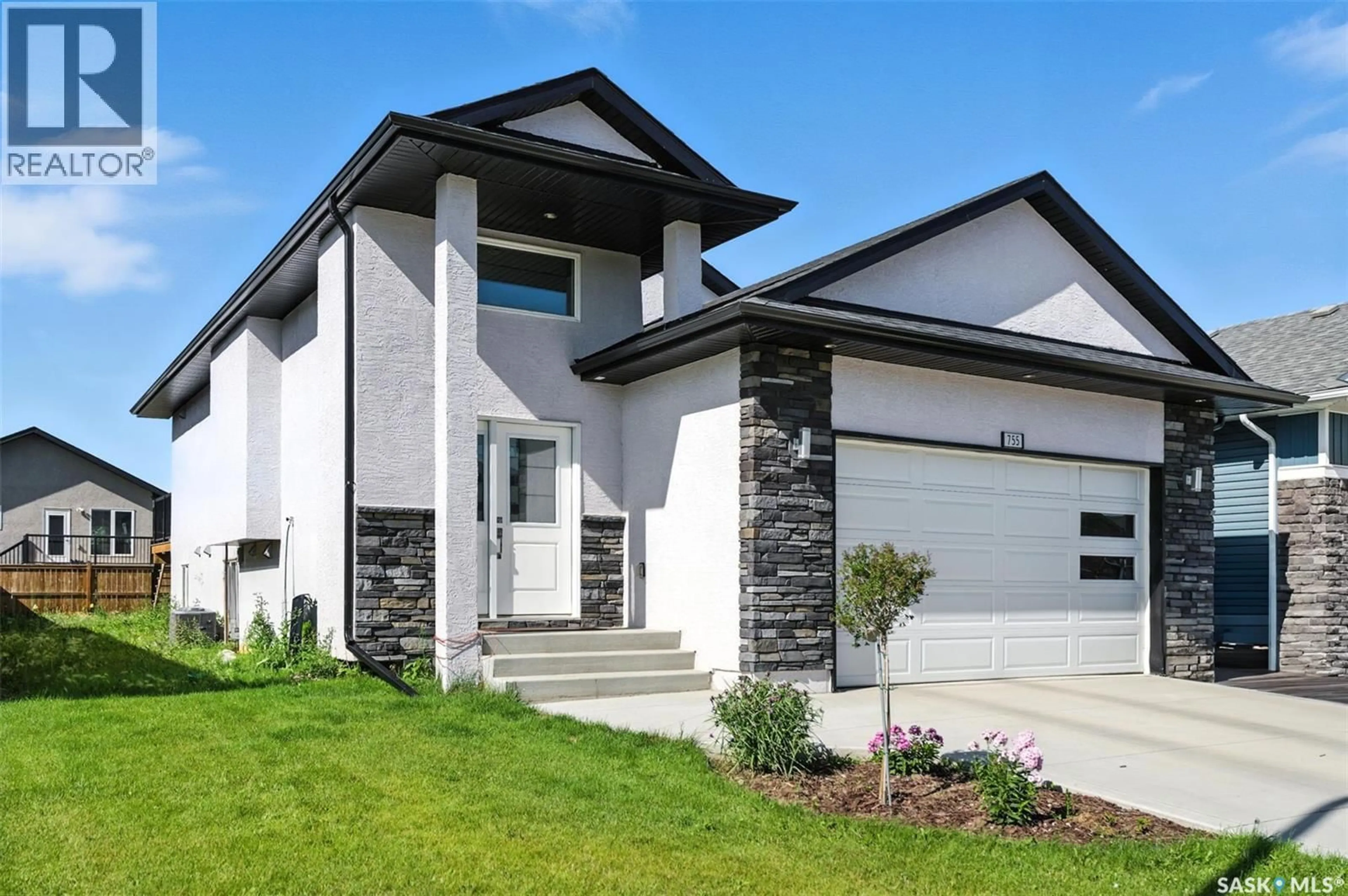 Home with brick exterior material, street for 755 LABINE COURT, Saskatoon Saskatchewan S7L6C8