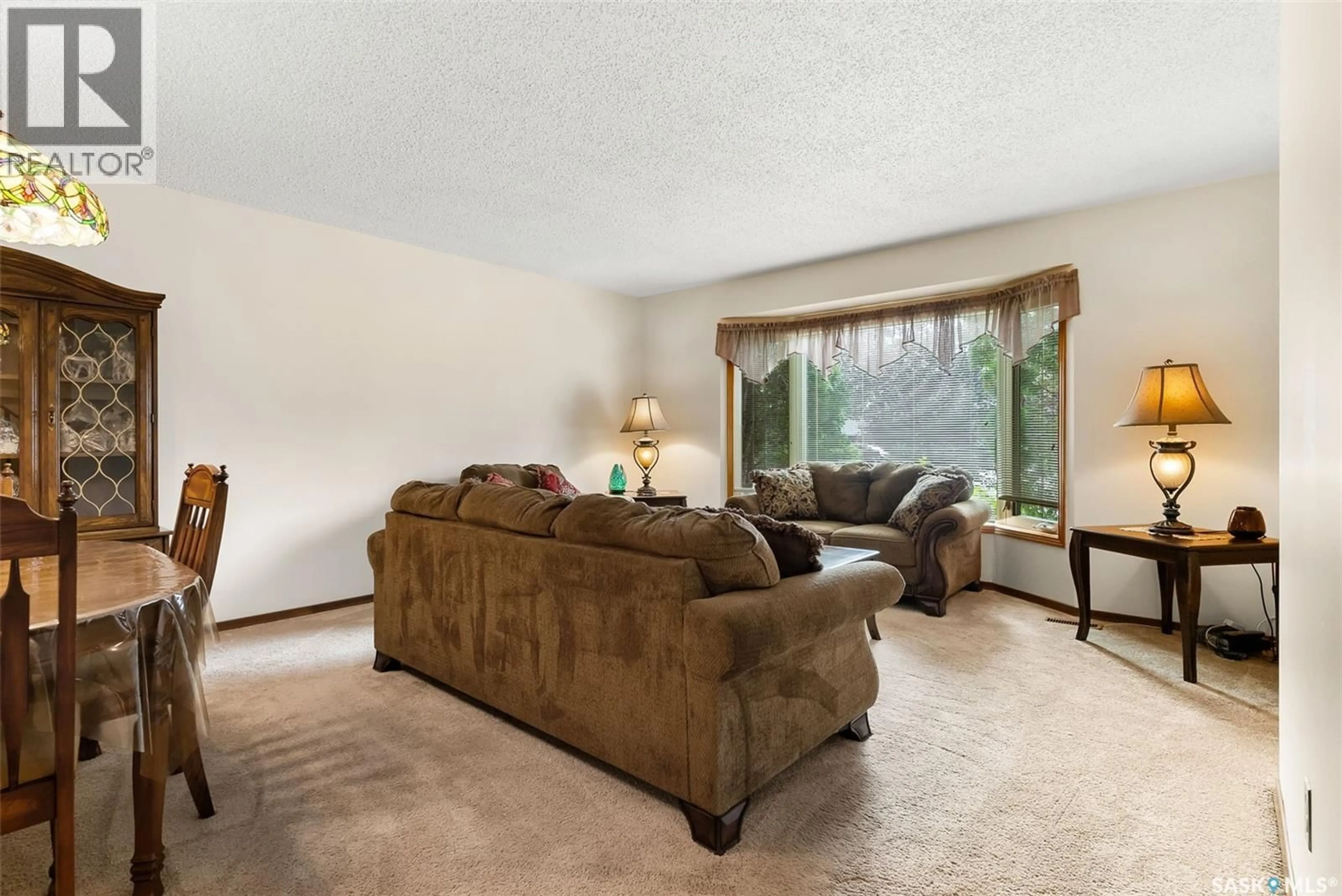 Living room with furniture, carpet floor for N - 1222 CATLEY BAY, Regina Saskatchewan S4X3A2