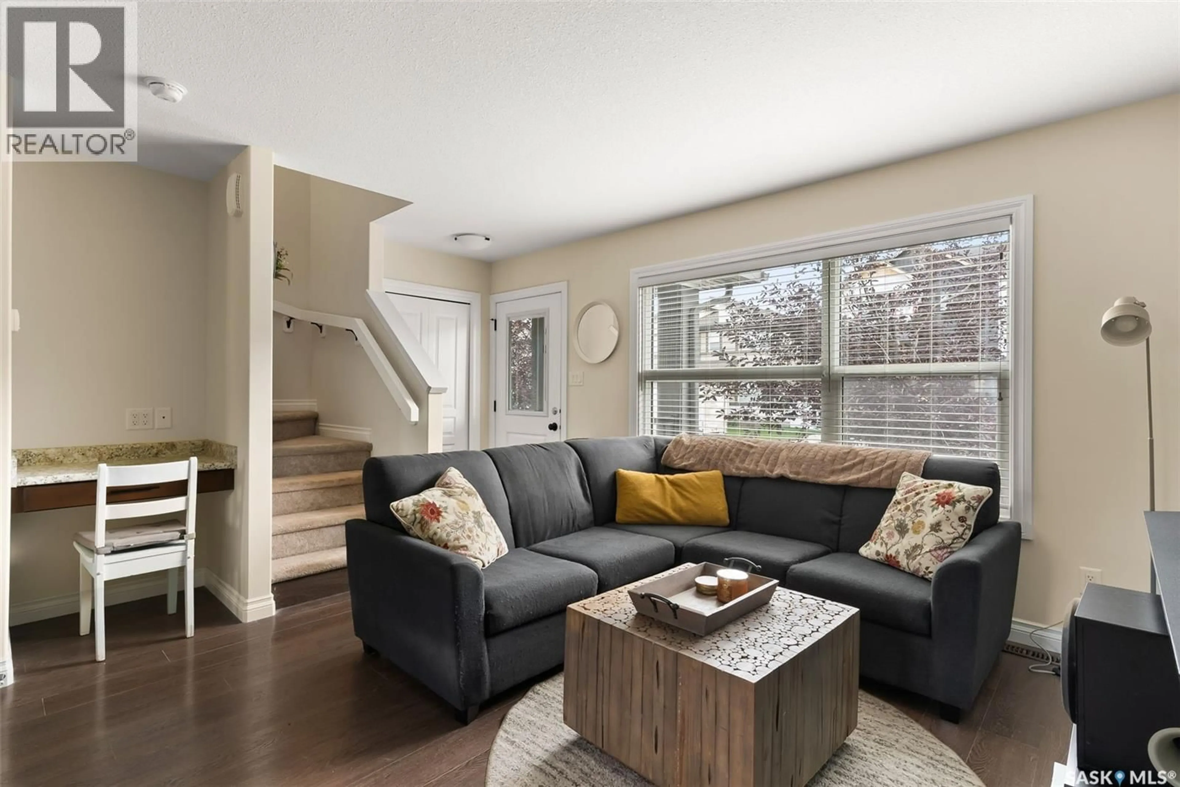 Living room with furniture, wood/laminate floor for 2846 ROCHDALE BOULEVARD, Regina Saskatchewan S4X0M6