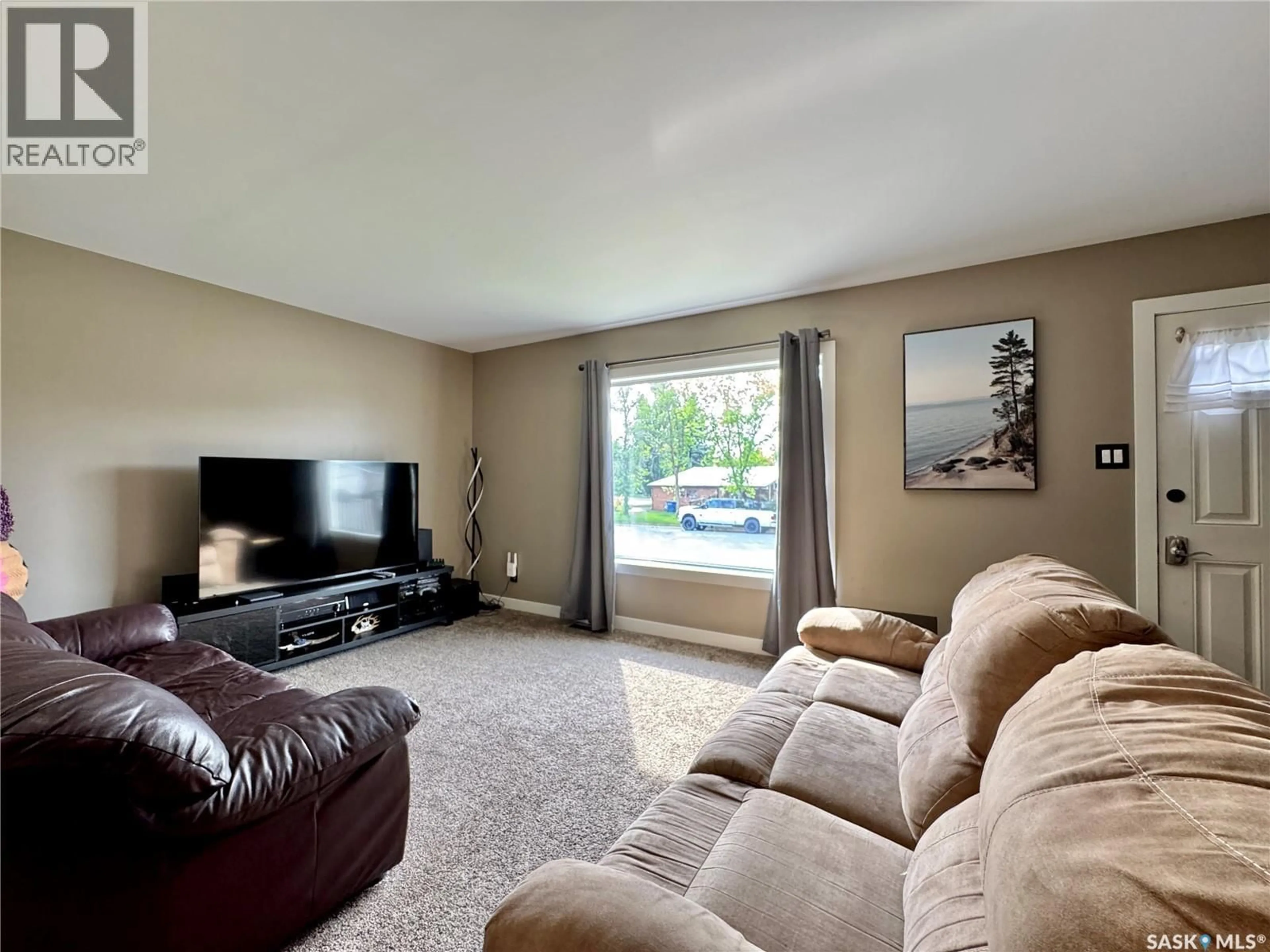 Living room with furniture, carpet floor for 503 EAST DRIVE, Esterhazy Saskatchewan S0A0X0