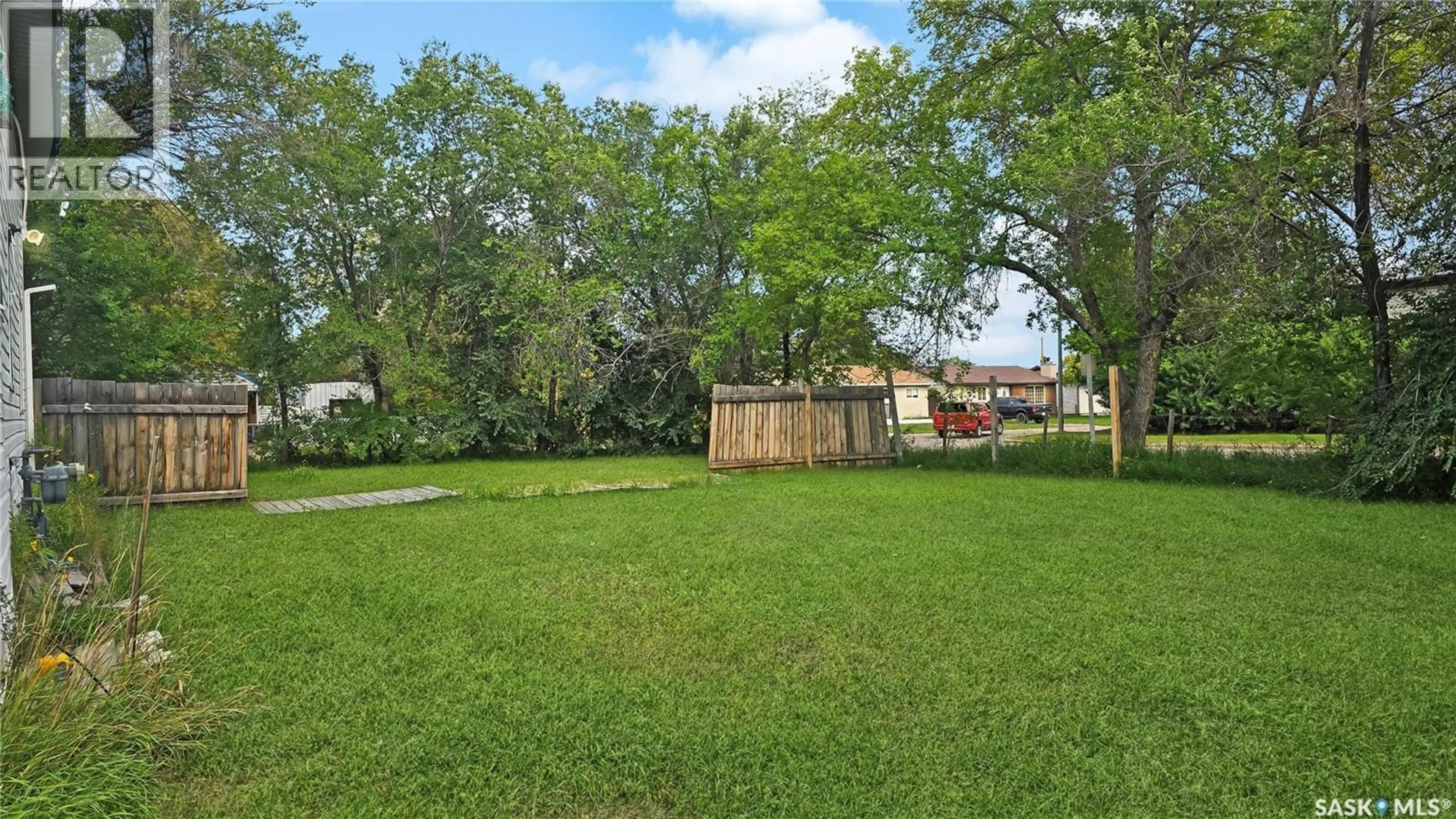 A pic from outside/outdoor area/front of a property/back of a property/a pic from drone, street for 1907 14TH STREET, Prince Albert Saskatchewan S6V3P3