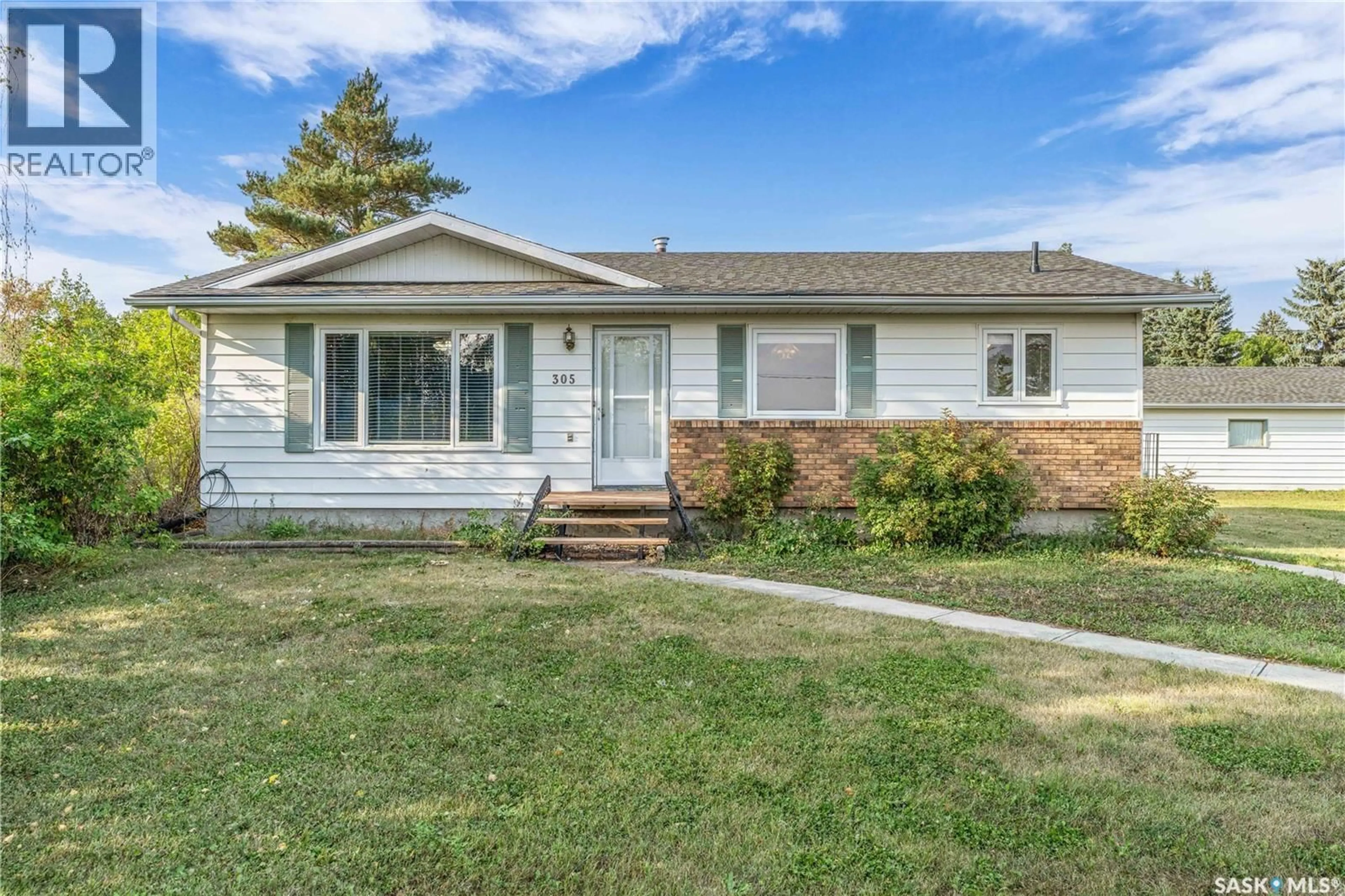 Home with vinyl exterior material, street for 305 3RD AVENUE, Edenwold Saskatchewan S0G1K0