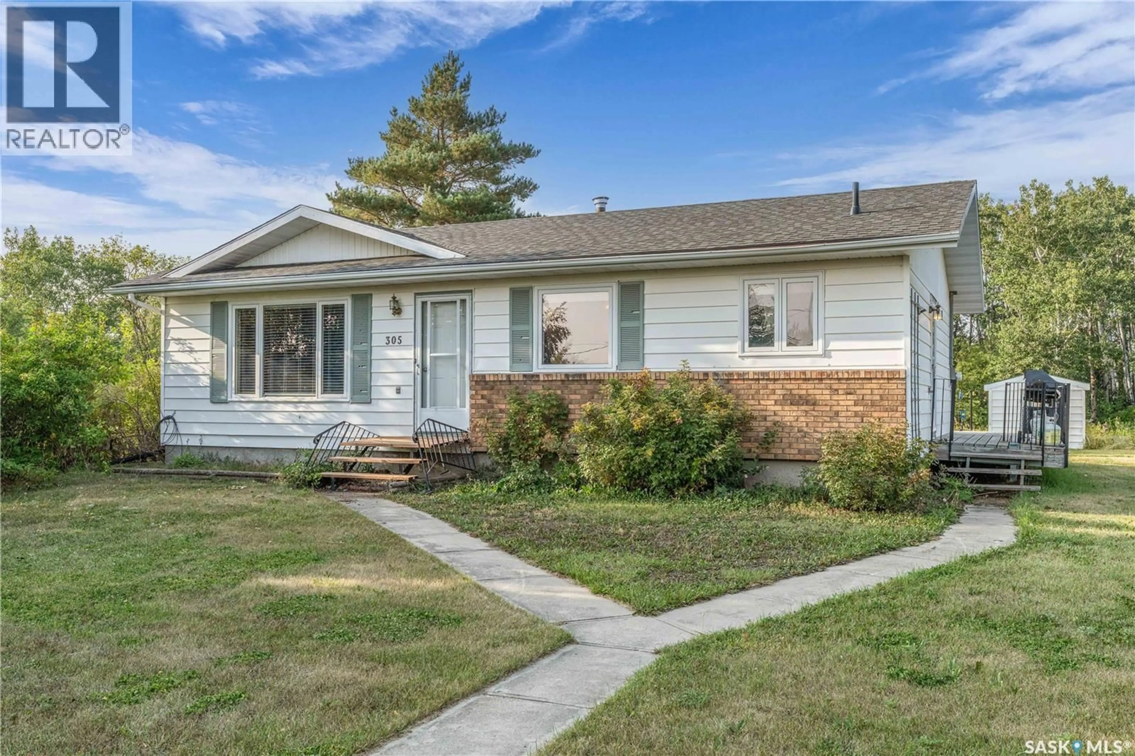Home with vinyl exterior material, street for 305 3RD AVENUE, Edenwold Saskatchewan S0G1K0
