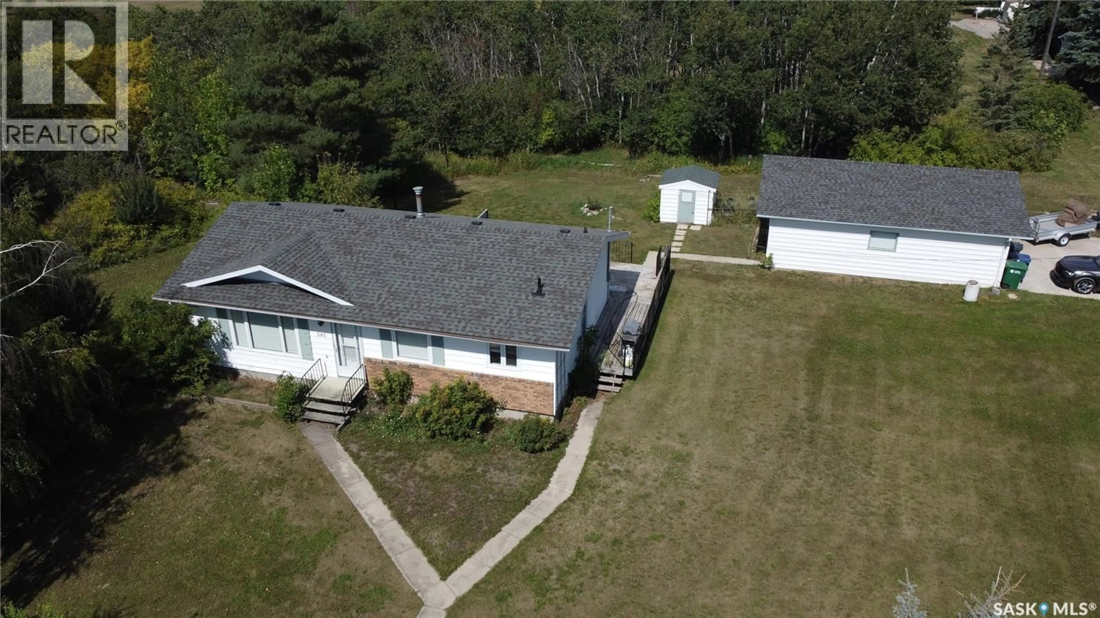 A pic from outside/outdoor area/front of a property/back of a property/a pic from drone, unknown for 305 3RD AVENUE, Edenwold Saskatchewan S0G1K0