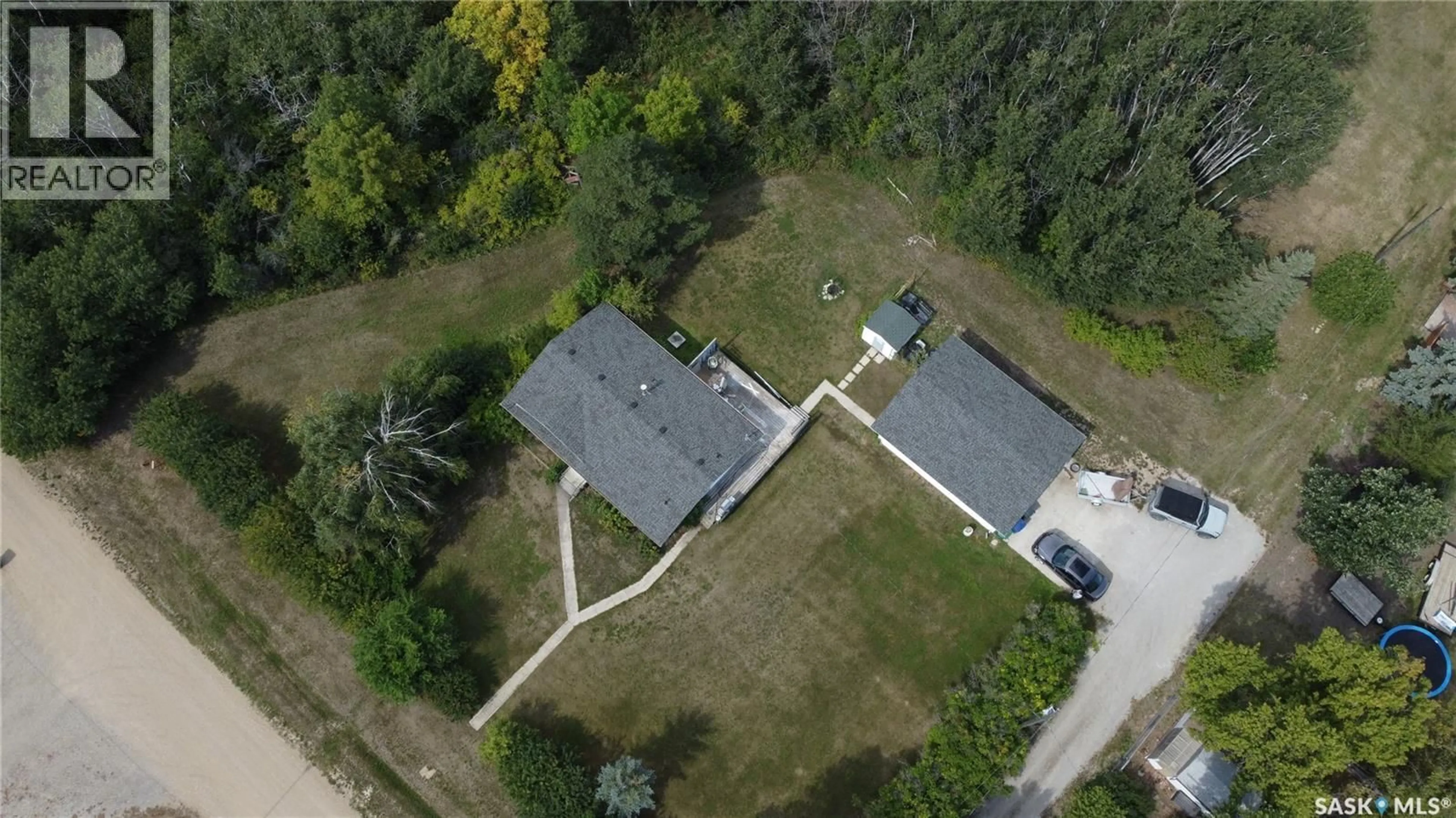 A pic from outside/outdoor area/front of a property/back of a property/a pic from drone, street for 305 3RD AVENUE, Edenwold Saskatchewan S0G1K0