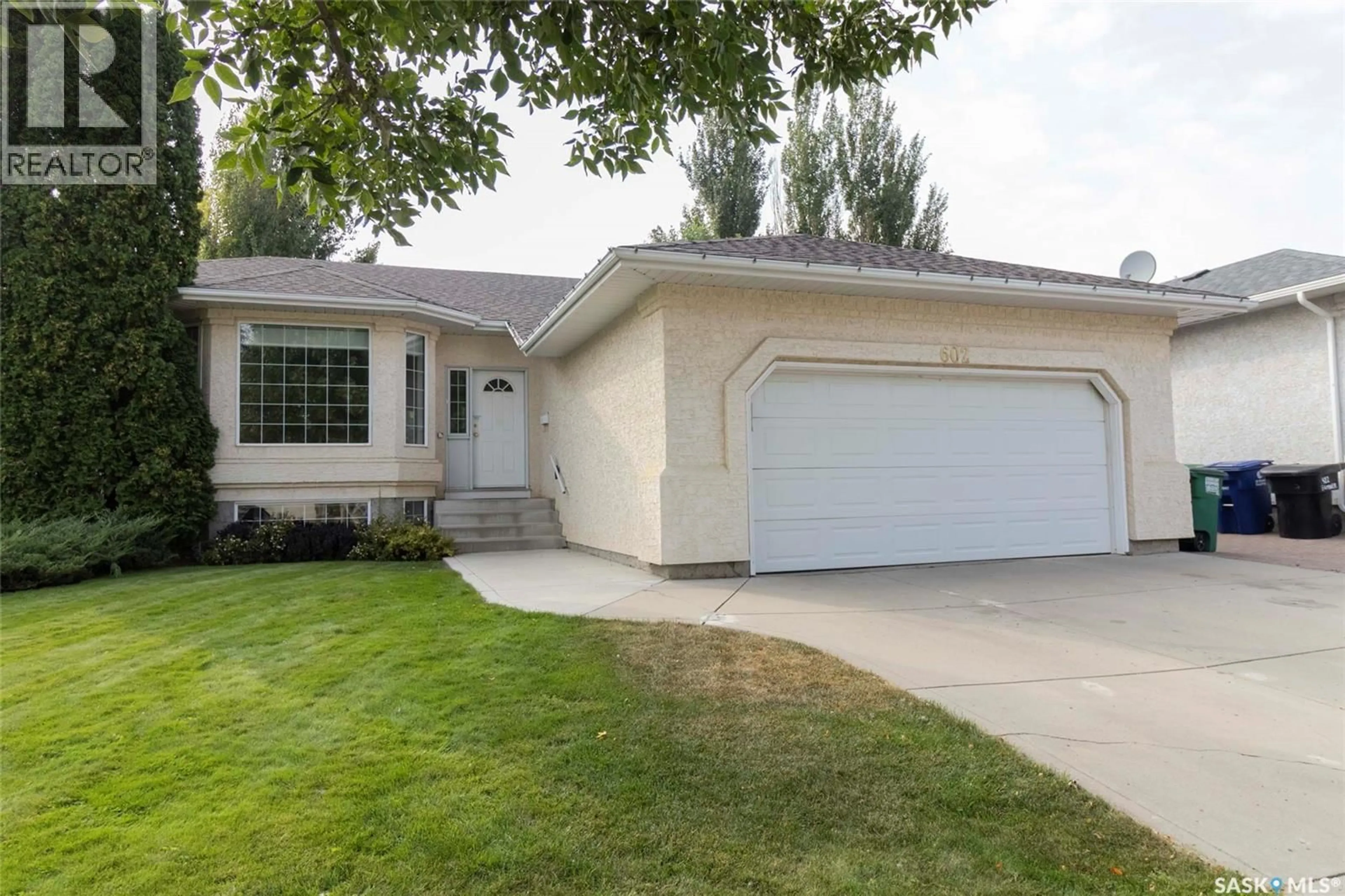Home with vinyl exterior material, street for 602 SUMNER LANE, Saskatoon Saskatchewan S7L7L9