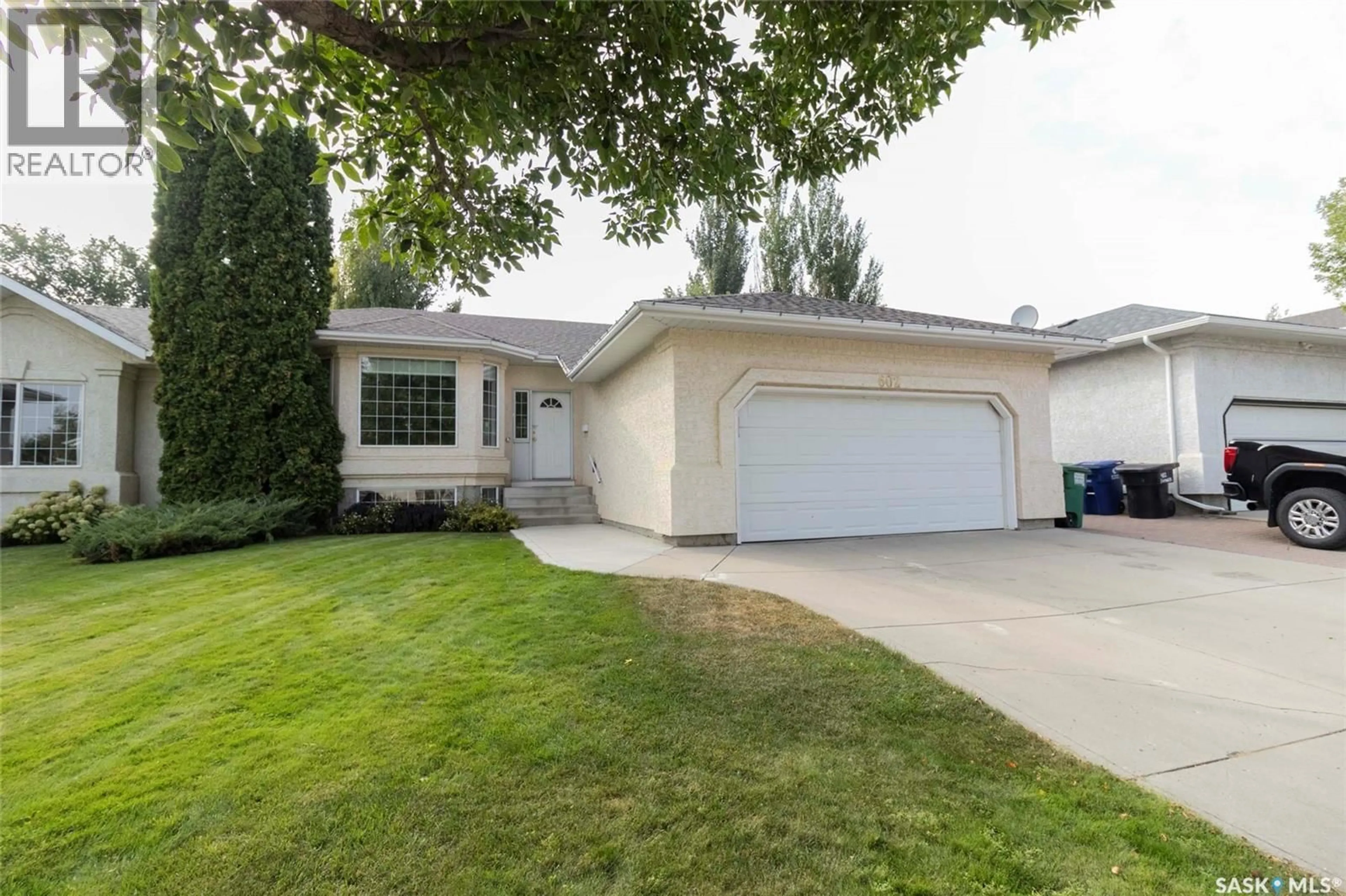 Home with vinyl exterior material, street for 602 SUMNER LANE, Saskatoon Saskatchewan S7L7L9