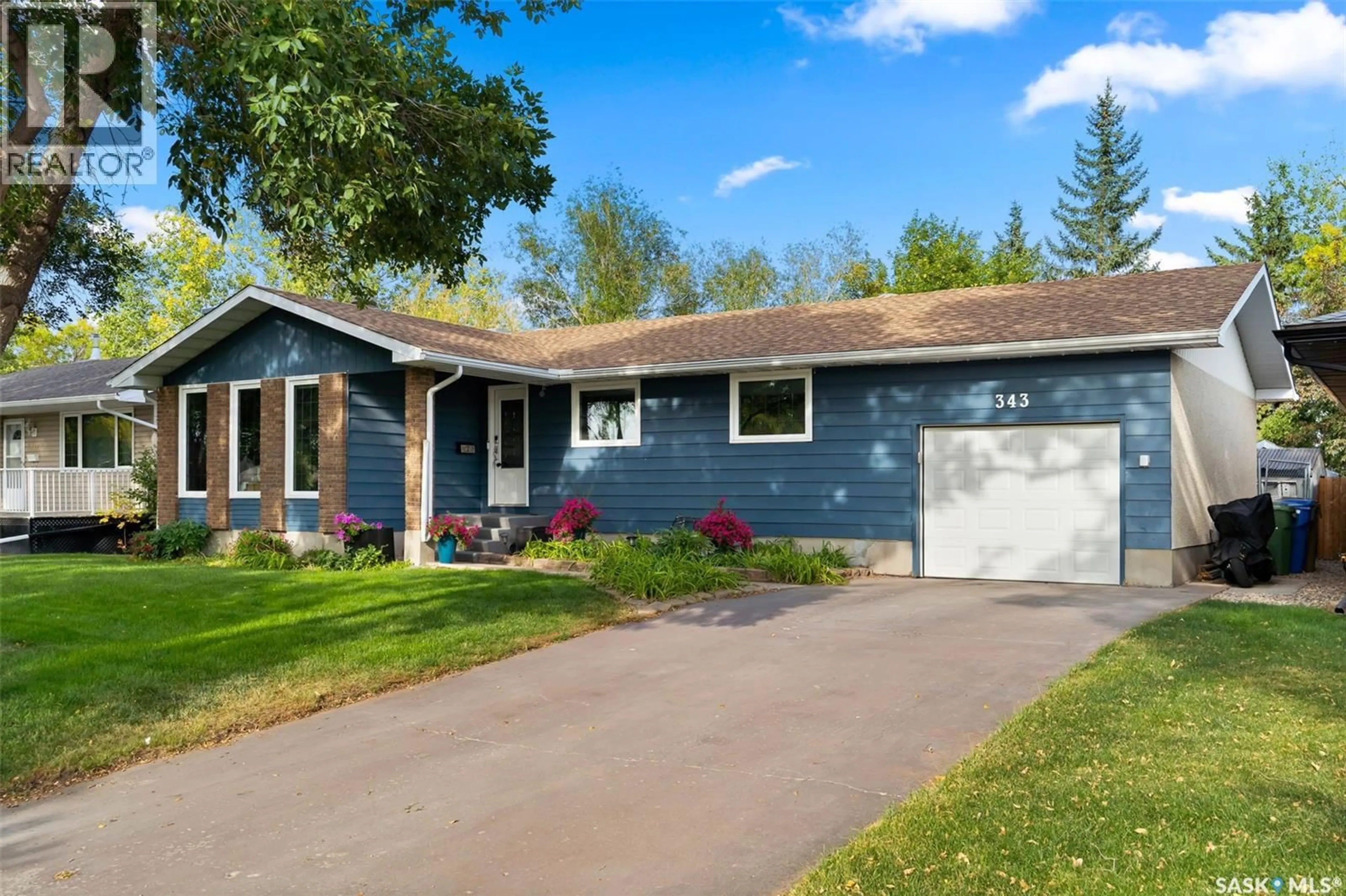Home with vinyl exterior material, street for 343 FAIRVIEW ROAD, Regina Saskatchewan S4R6W2