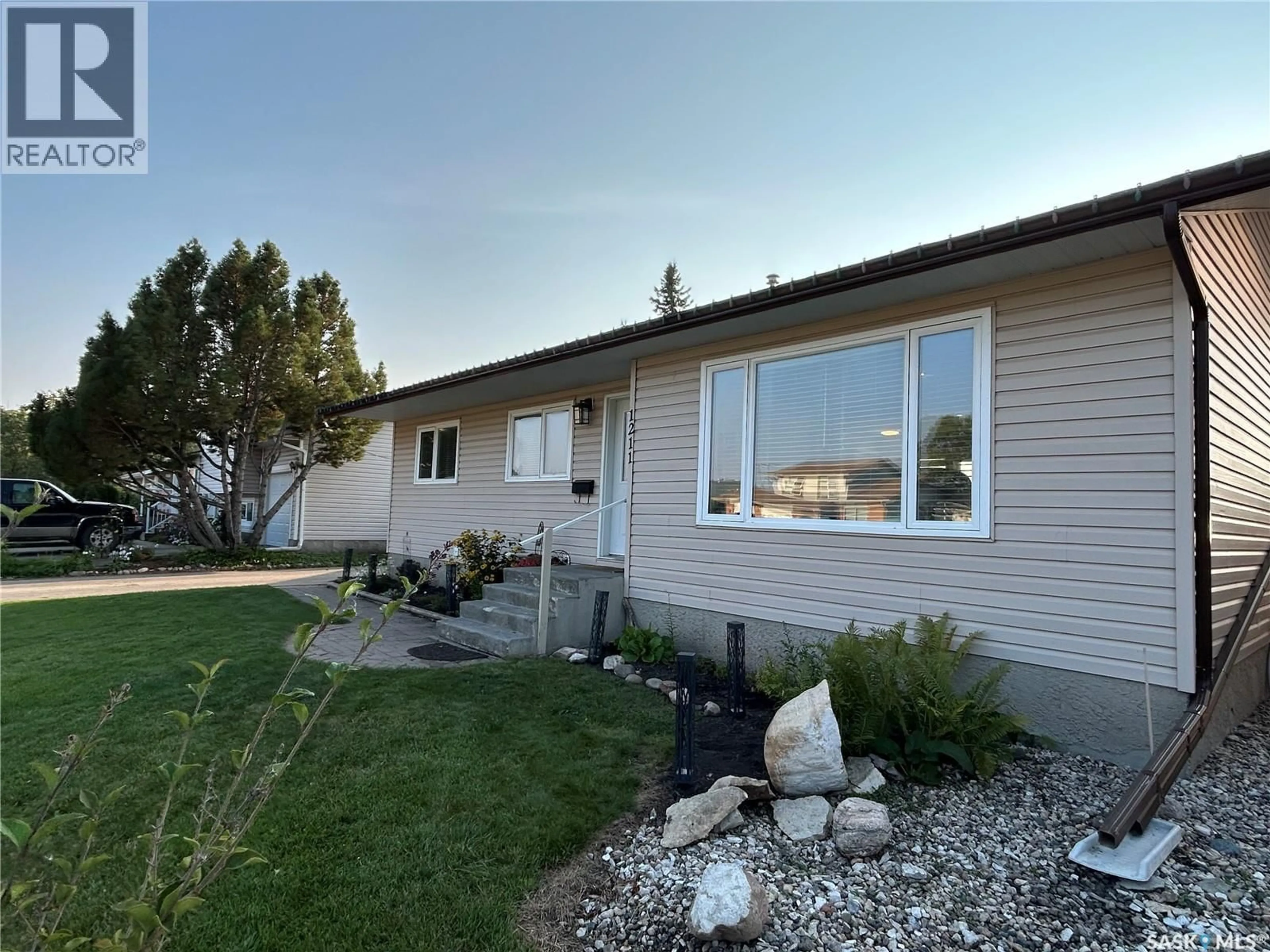 Home with vinyl exterior material, unknown for 1211 13TH STREET, Humboldt Saskatchewan S0K2A0