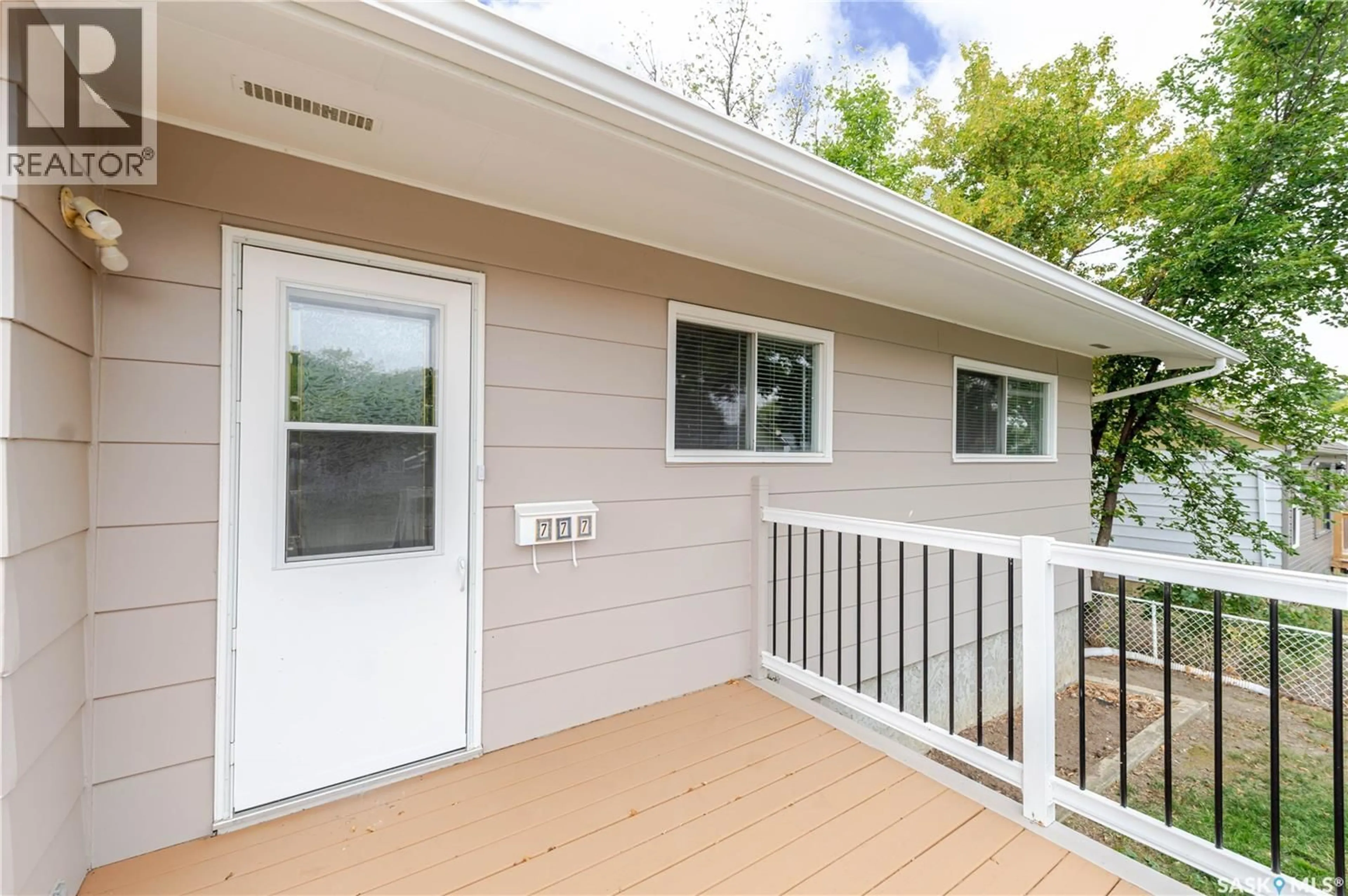 Home with vinyl exterior material, street for E - 777 HOCHELAGA STREET, Moose Jaw Saskatchewan S6H0P9