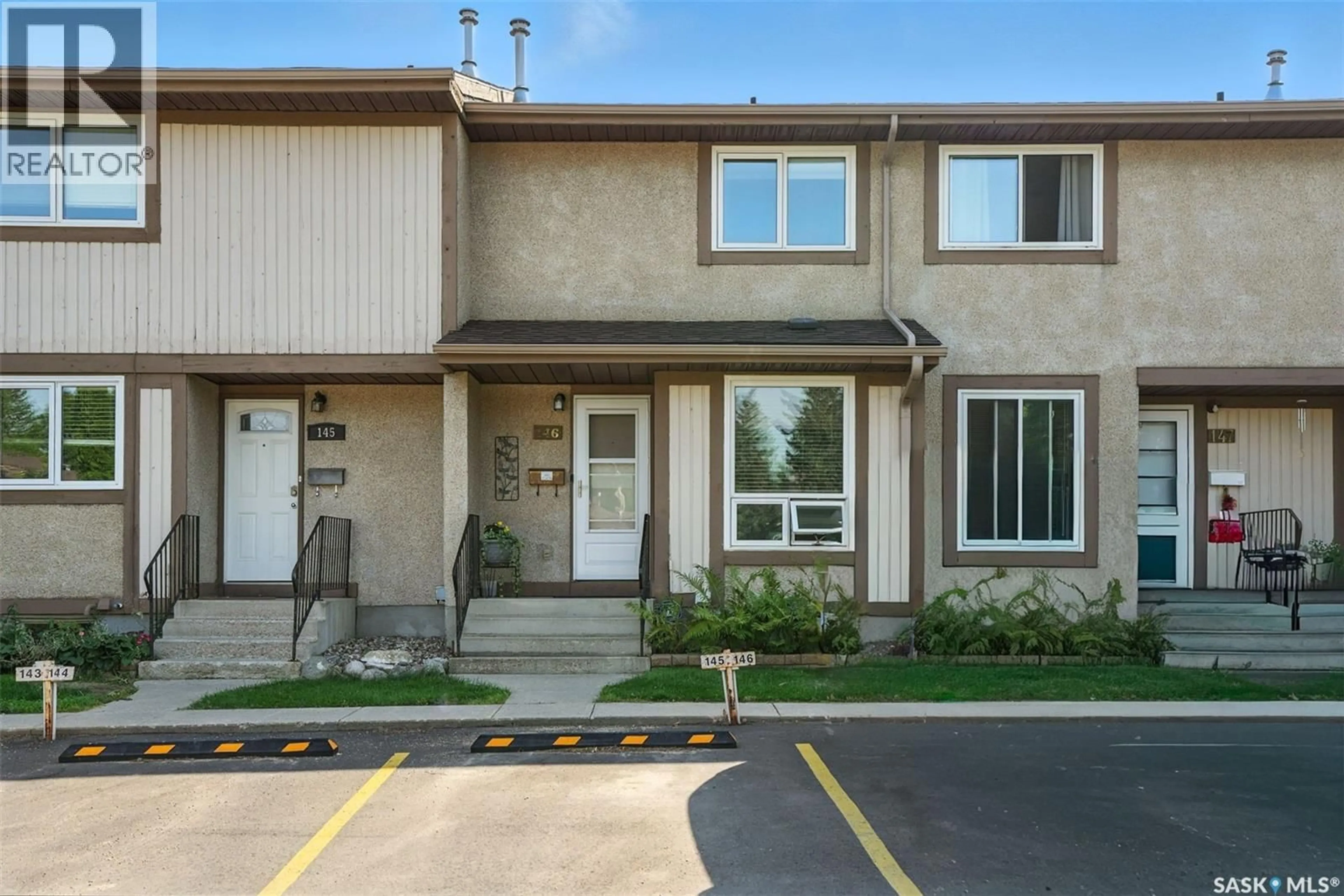 Home with vinyl exterior material, street for 1128 - 146 MCKERCHER DRIVE, Saskatoon Saskatchewan S7H4Y7