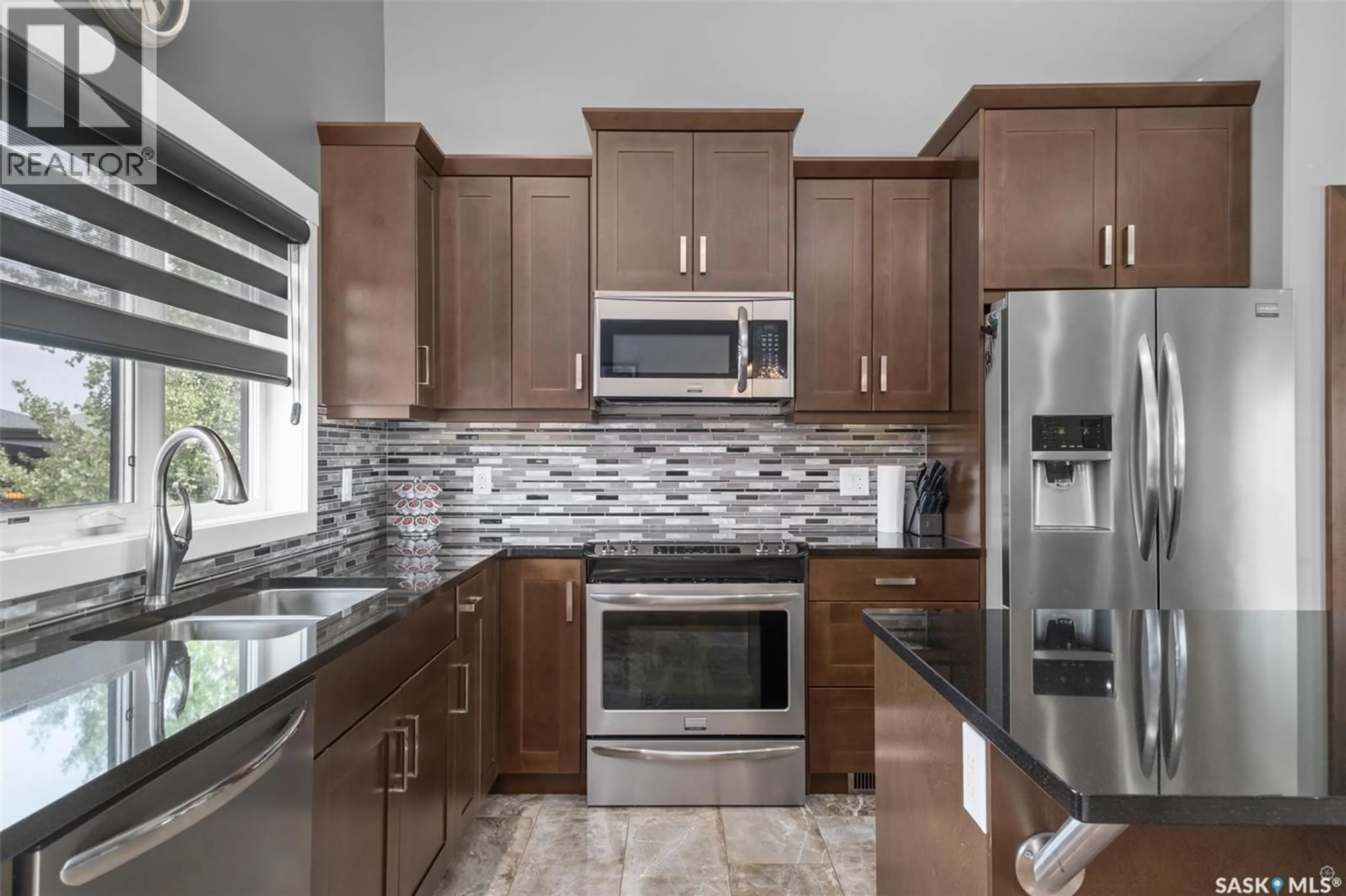 Contemporary kitchen, ceramic/tile floor for 19 GREENSHIELDS LANE, Prince Albert Saskatchewan S6X0A6