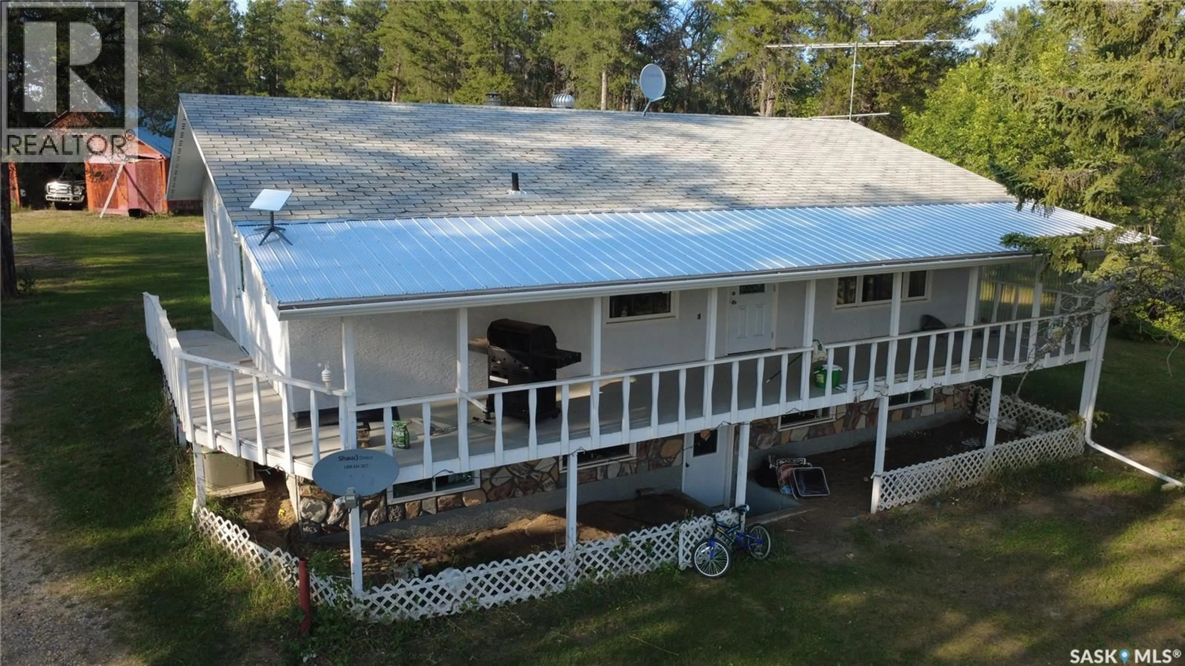 A pic from outside/outdoor area/front of a property/back of a property/a pic from drone, building for 4107 FOREST DRIVE, Buckland Rm No. 491 Saskatchewan S6V5R3