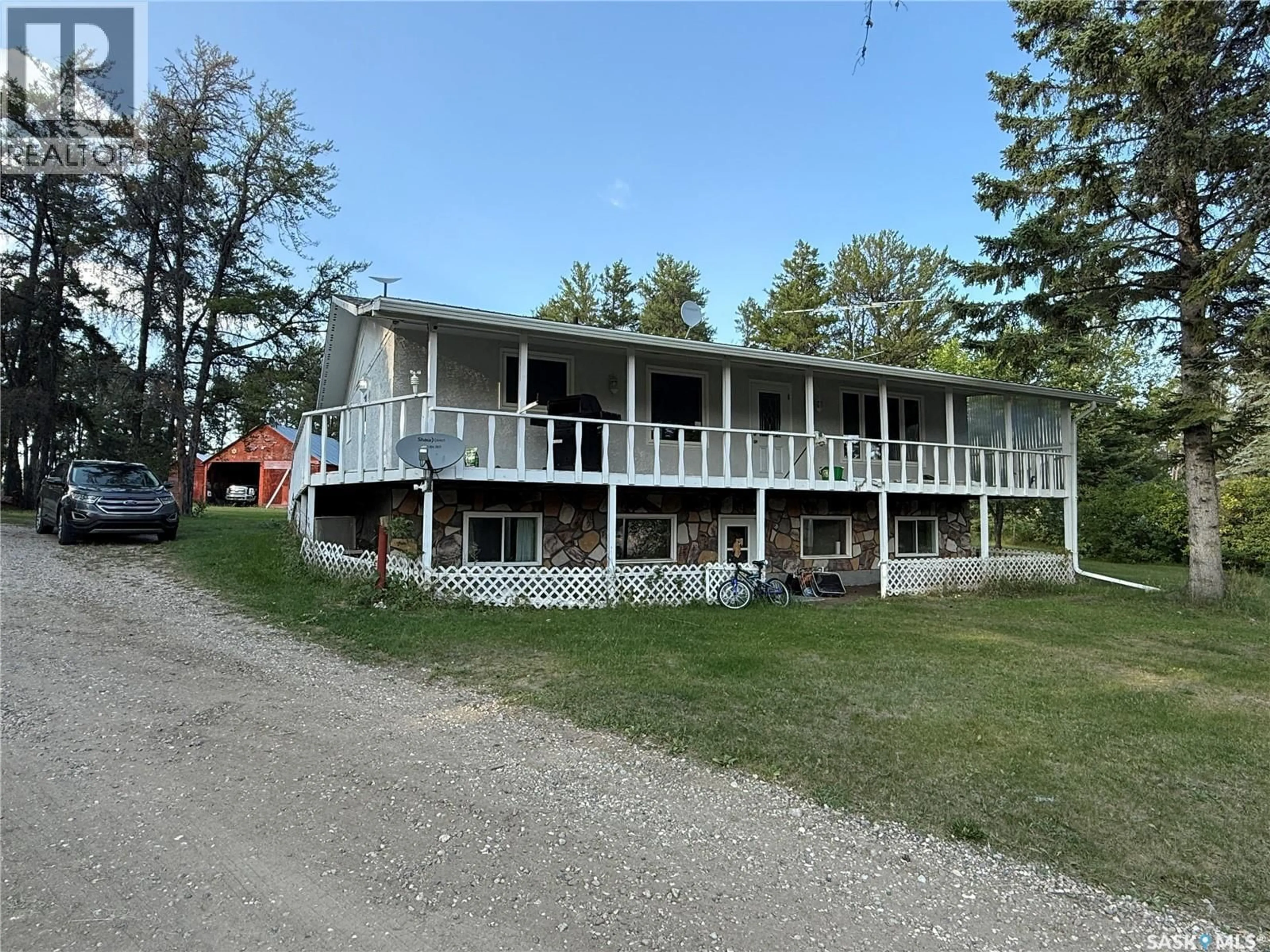 A pic from outside/outdoor area/front of a property/back of a property/a pic from drone, unknown for 4107 FOREST DRIVE, Buckland Rm No. 491 Saskatchewan S6V5R3