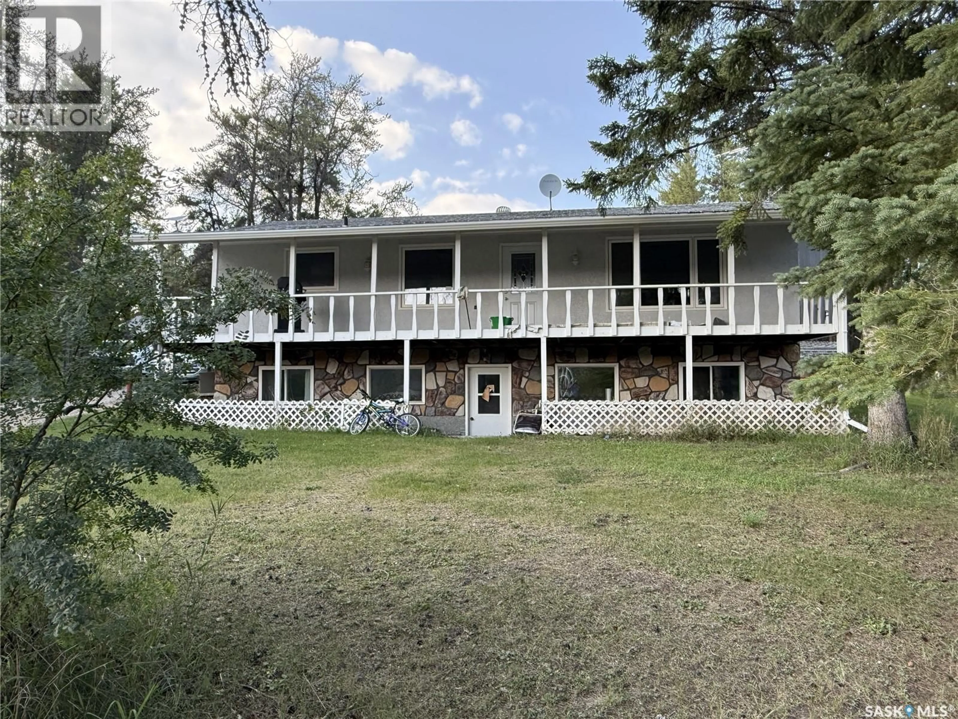 A pic from outside/outdoor area/front of a property/back of a property/a pic from drone, unknown for 4107 FOREST DRIVE, Buckland Rm No. 491 Saskatchewan S6V5R3