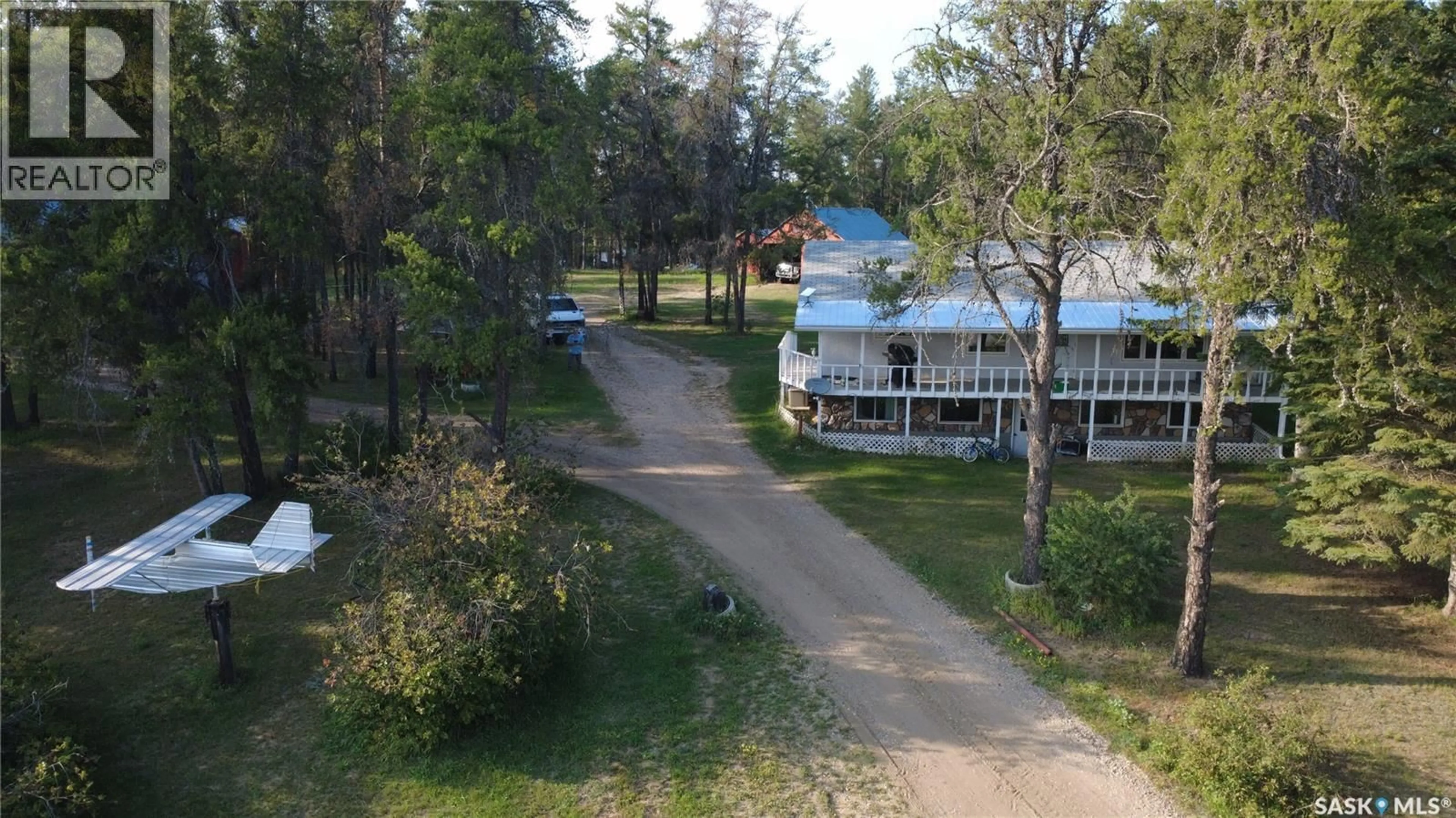 A pic from outside/outdoor area/front of a property/back of a property/a pic from drone, water/lake/river/ocean view for 4107 FOREST DRIVE, Buckland Rm No. 491 Saskatchewan S6V5R3
