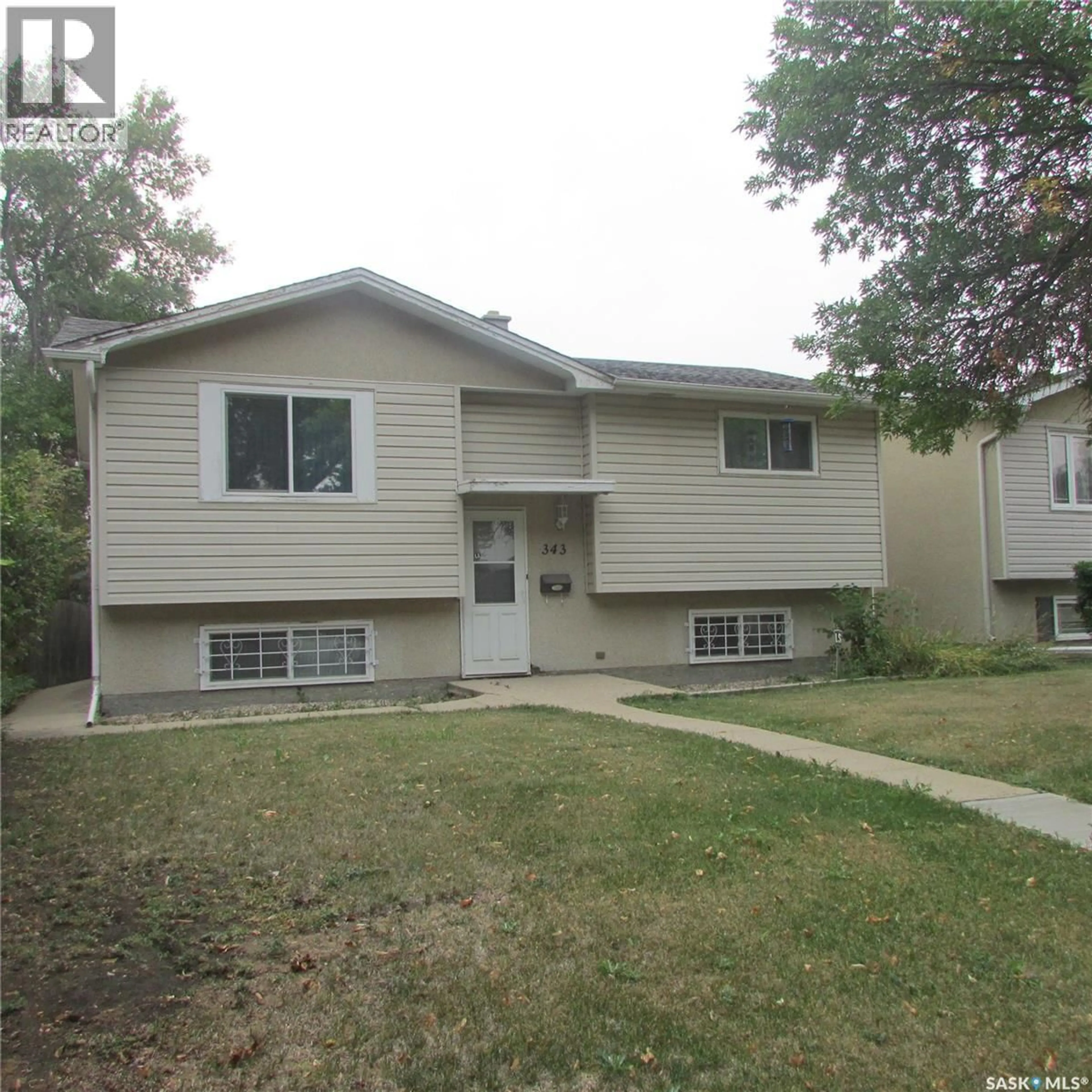 Home with vinyl exterior material, street for 343 BRUCE STREET, Regina Saskatchewan S4R5H2