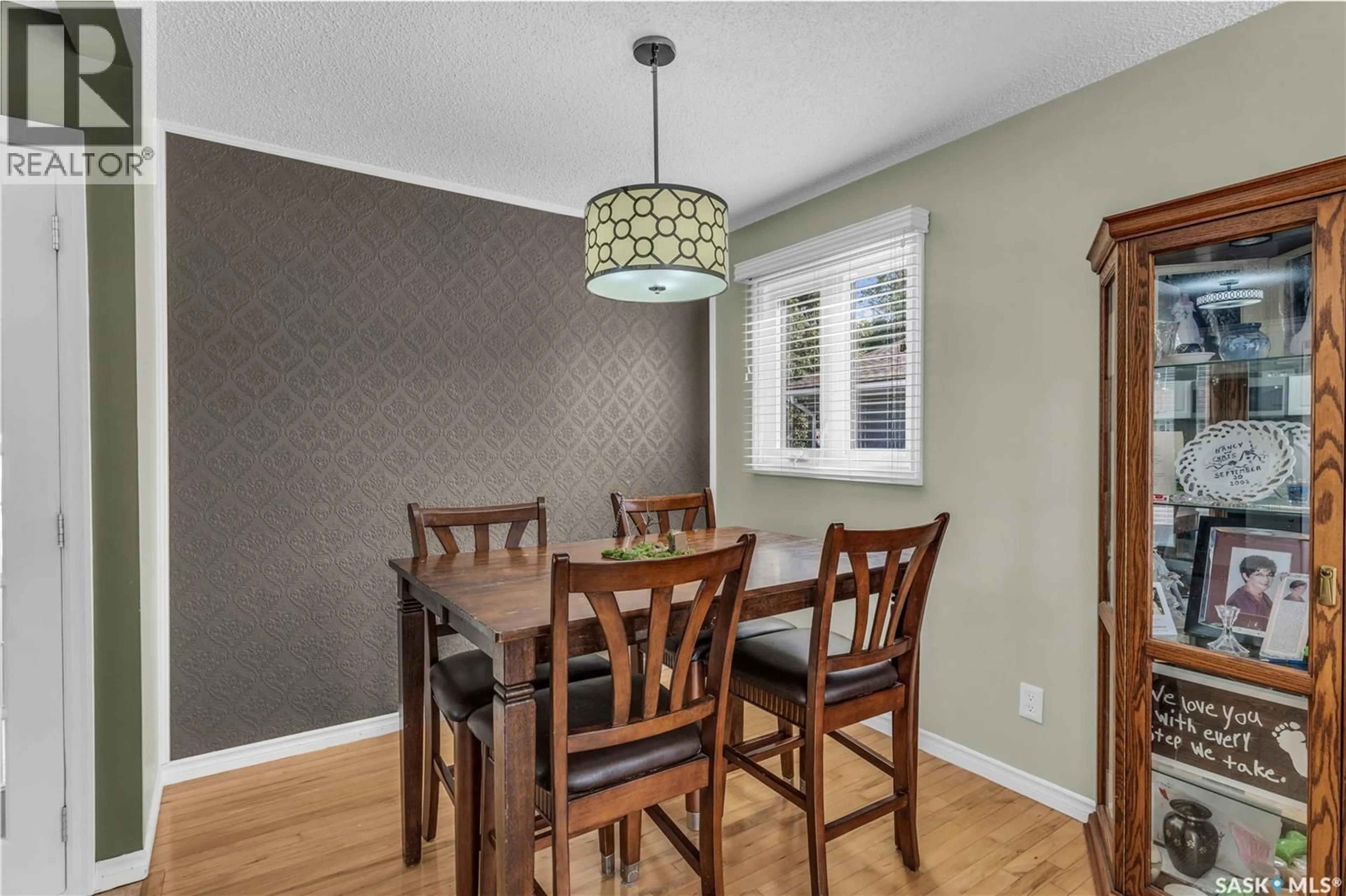 Dining room, wood/laminate floor for 34 SCRIVENER CRESCENT, Regina Saskatchewan S4N4V7