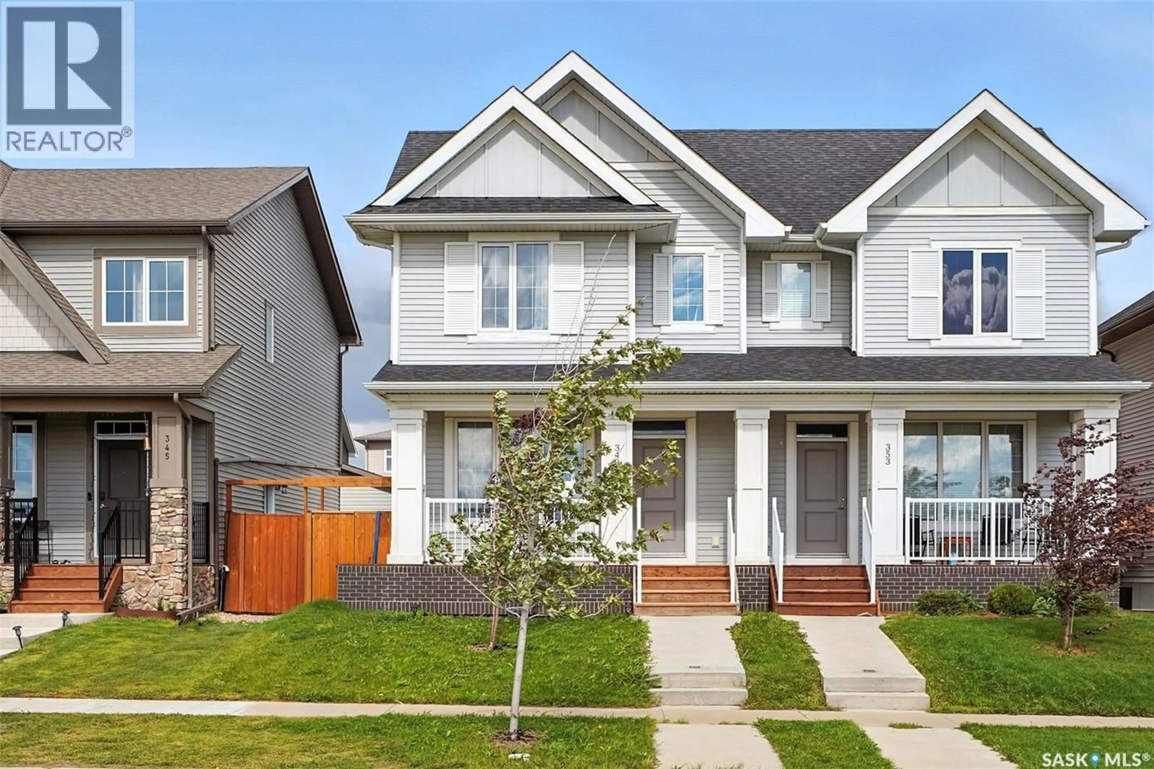 Home with vinyl exterior material, street for 349 BRIGHTON BOULEVARD, Saskatoon Saskatchewan S7V0R5