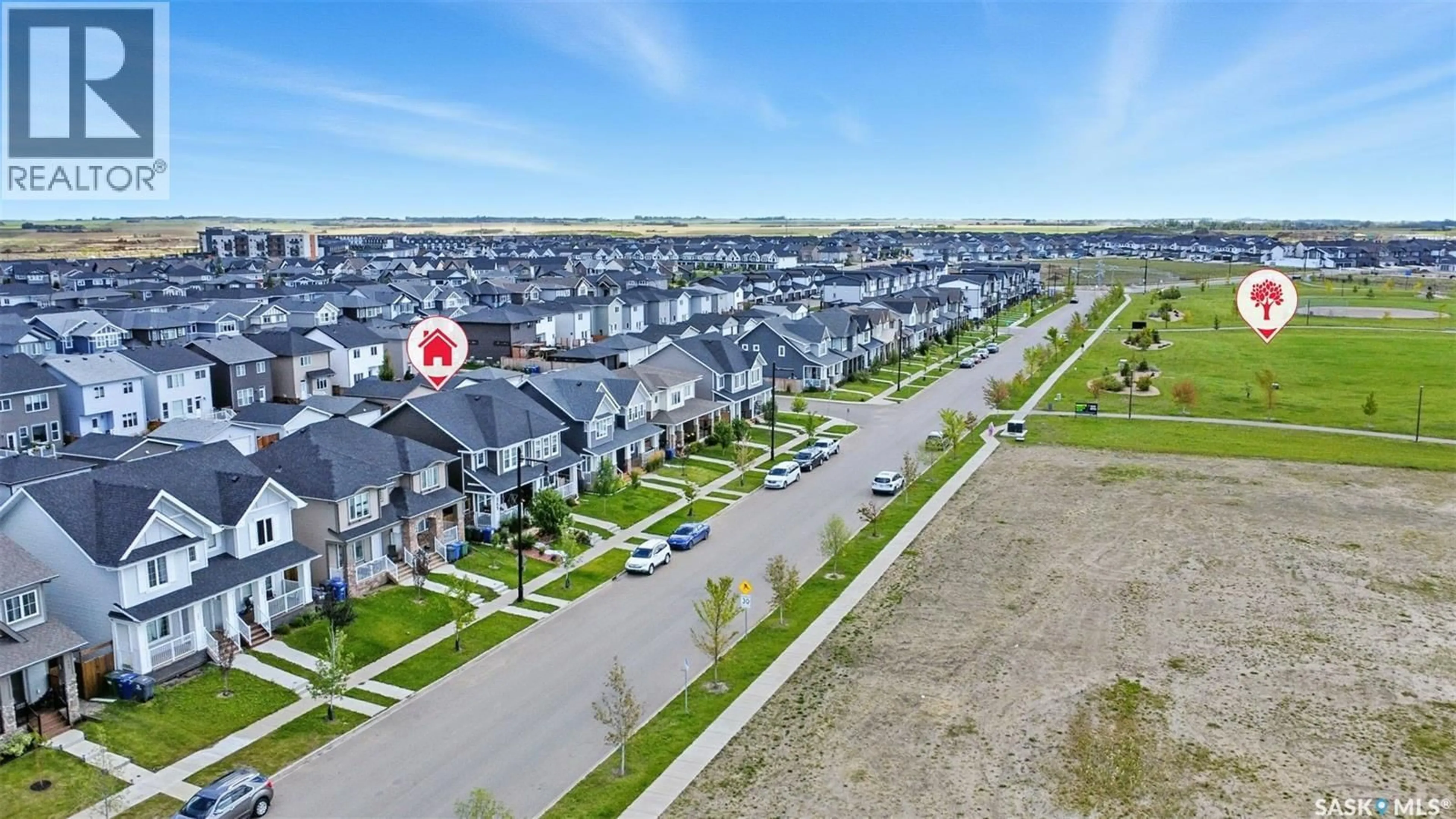 A pic from outside/outdoor area/front of a property/back of a property/a pic from drone, street for 349 BRIGHTON BOULEVARD, Saskatoon Saskatchewan S7V0R5
