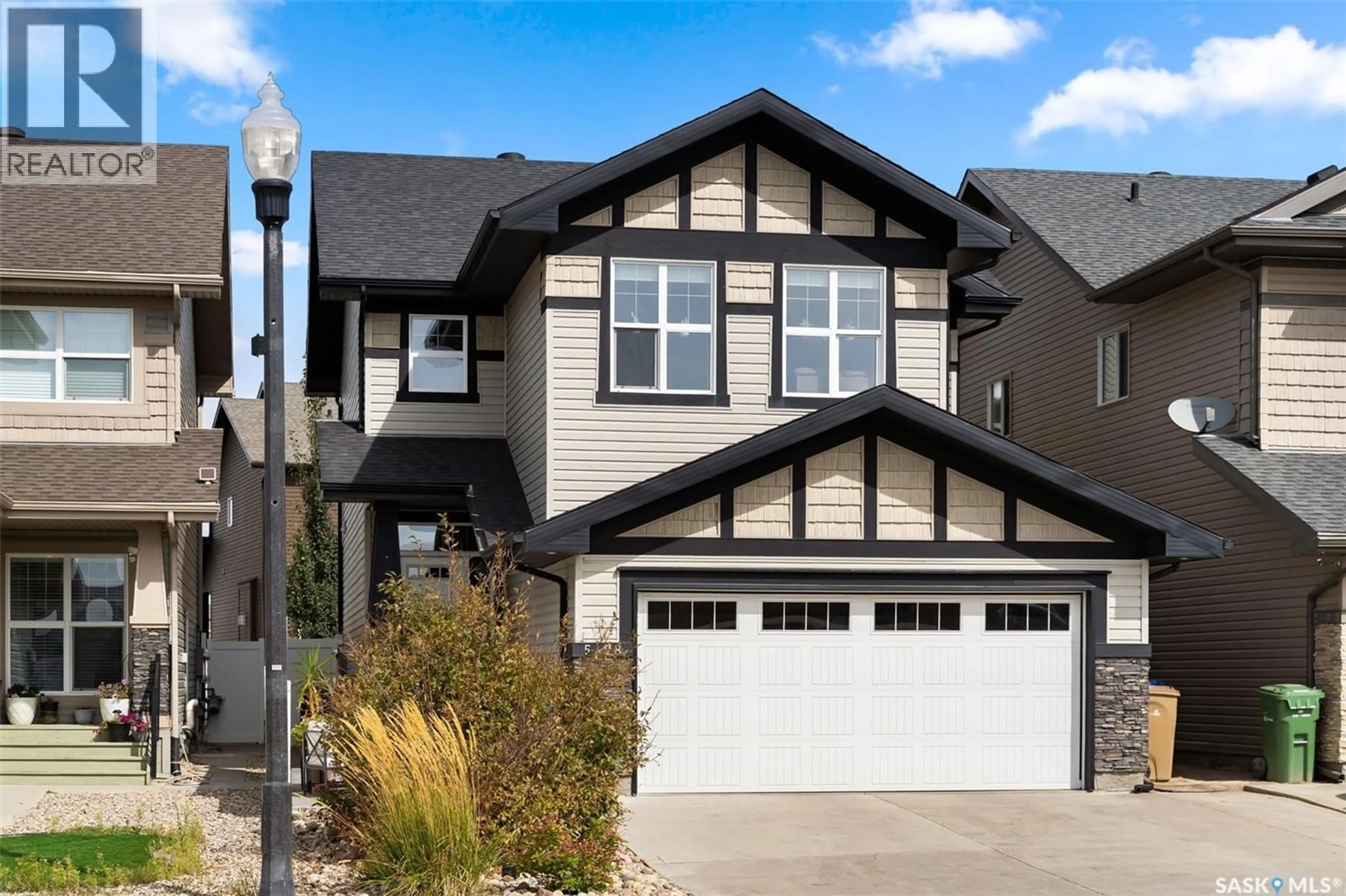Home with vinyl exterior material, street for 5428 GREEN APPLE DRIVE, Regina Saskatchewan S4V3M8
