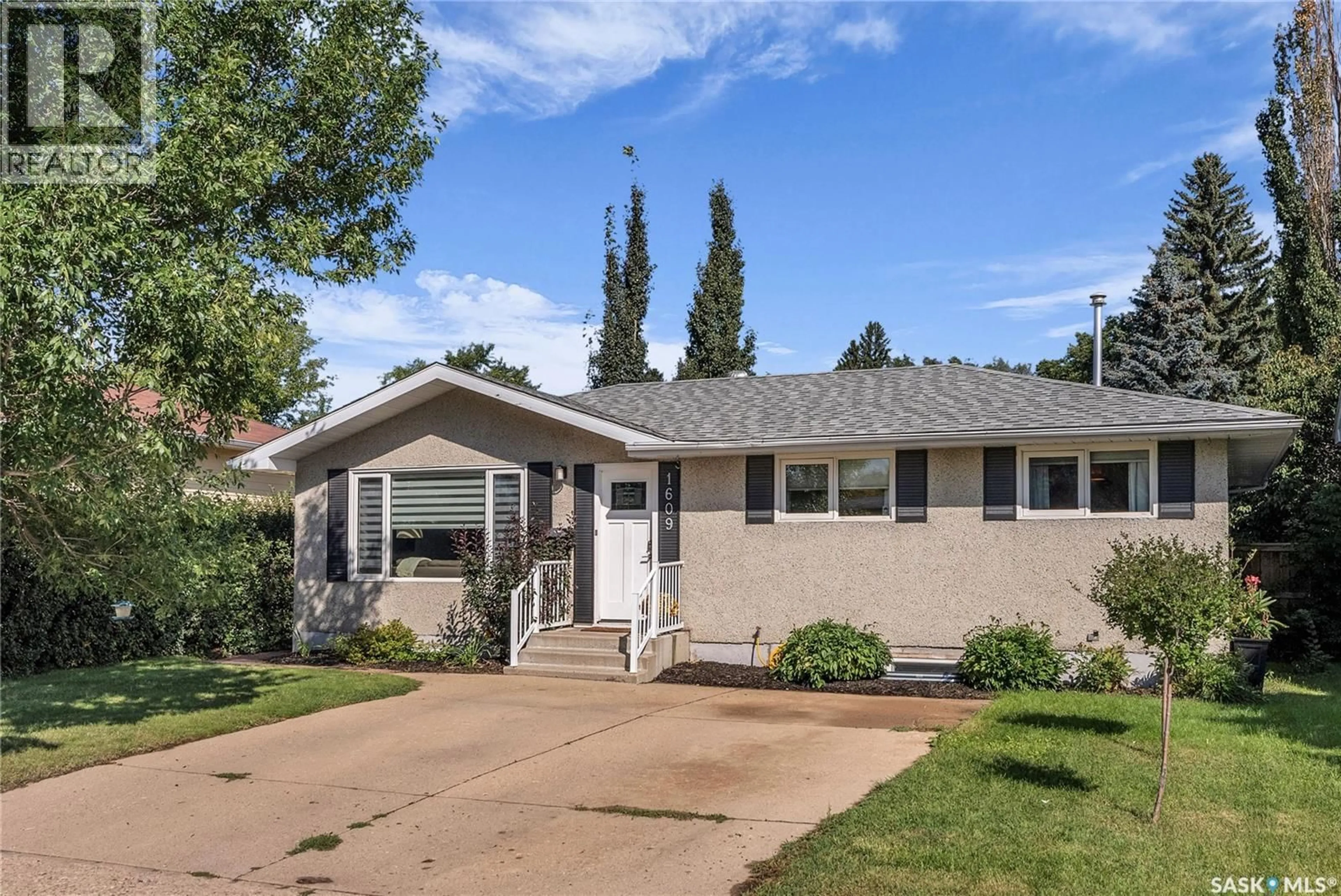 Home with vinyl exterior material, street for 1609 RUTH STREET, Saskatoon Saskatchewan S7J0L7