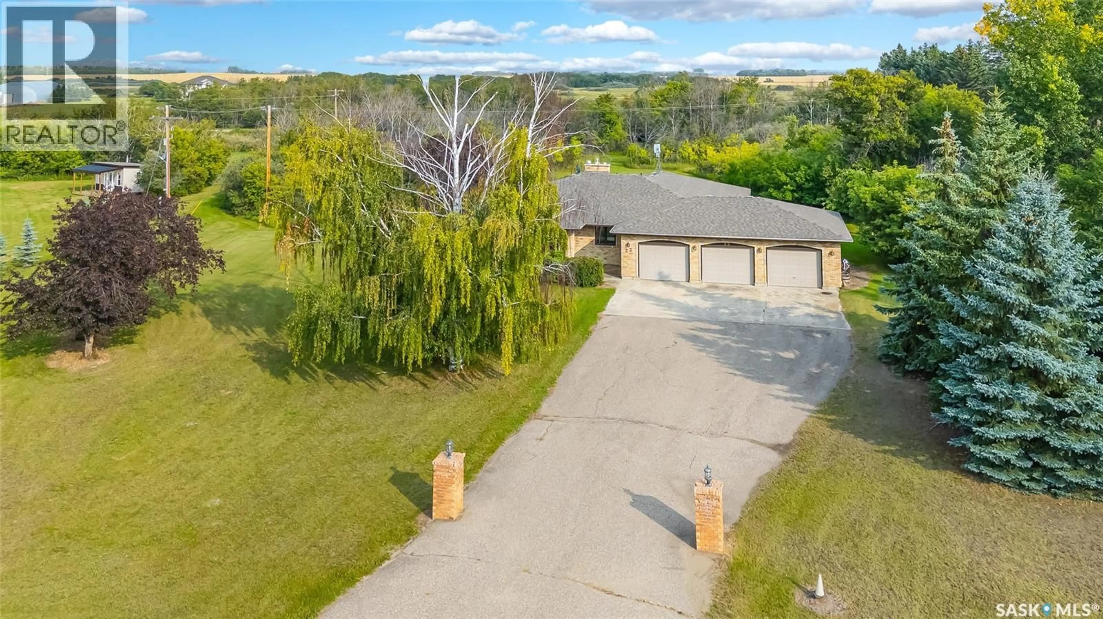 A pic from outside/outdoor area/front of a property/back of a property/a pic from drone, unknown for 22 REDWOOD DRIVE, Corman Park Rm No. 344 Saskatchewan S7K3J6