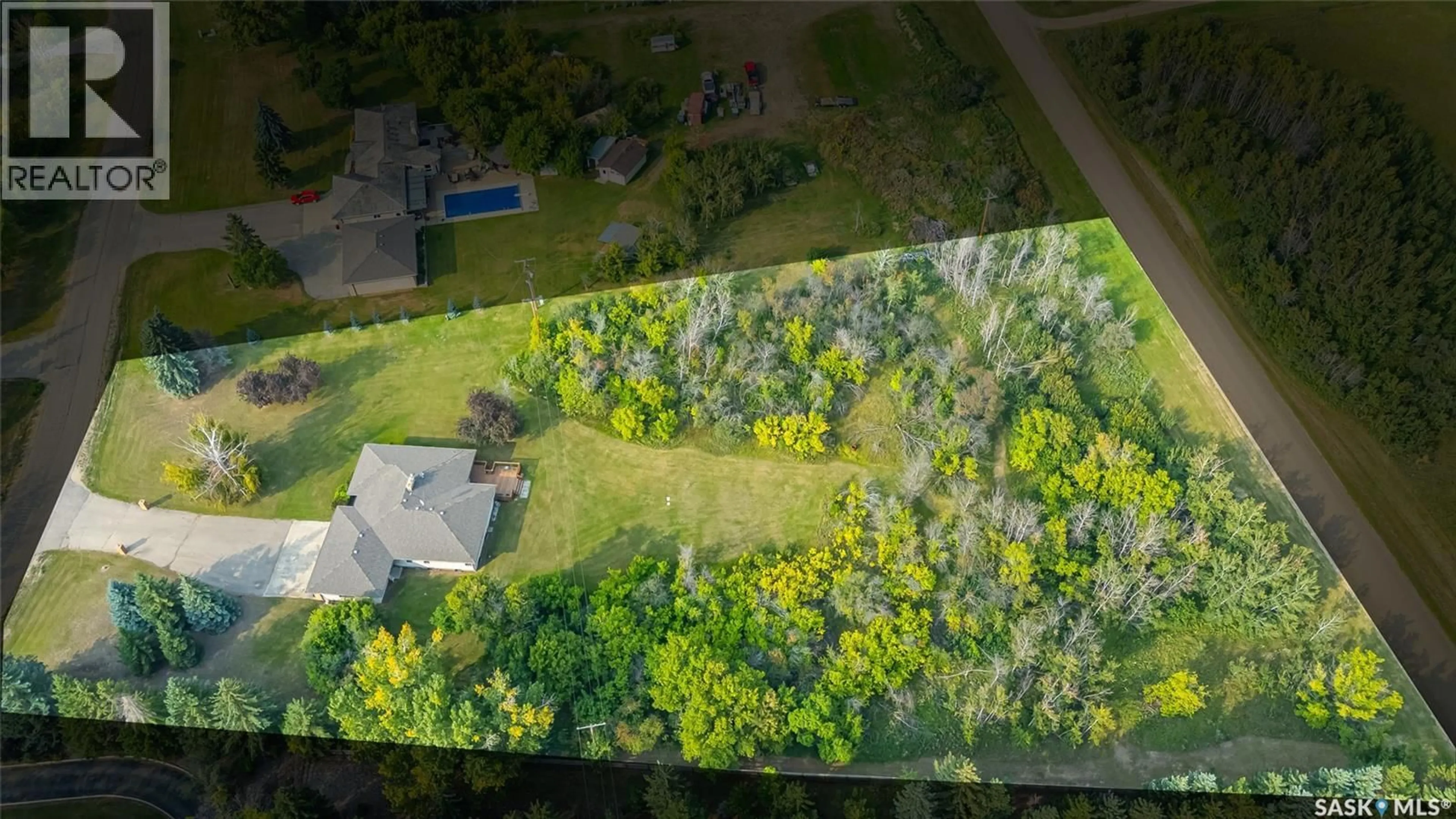 A pic from outside/outdoor area/front of a property/back of a property/a pic from drone, forest/trees view for 22 REDWOOD DRIVE, Corman Park Rm No. 344 Saskatchewan S7K3J6
