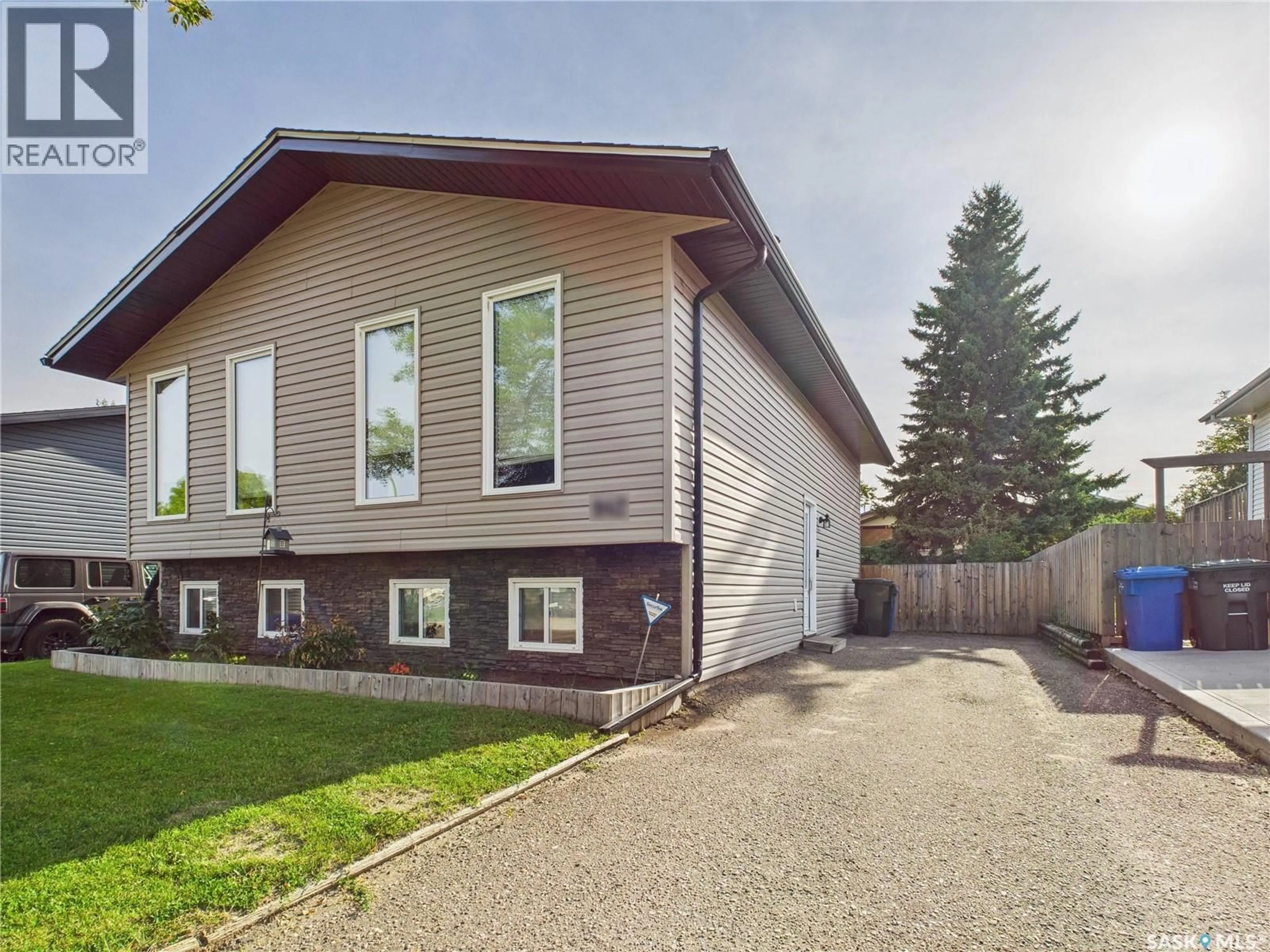 Home with vinyl exterior material, street for 842 SPENCER DRIVE, Prince Albert Saskatchewan S6V7C9