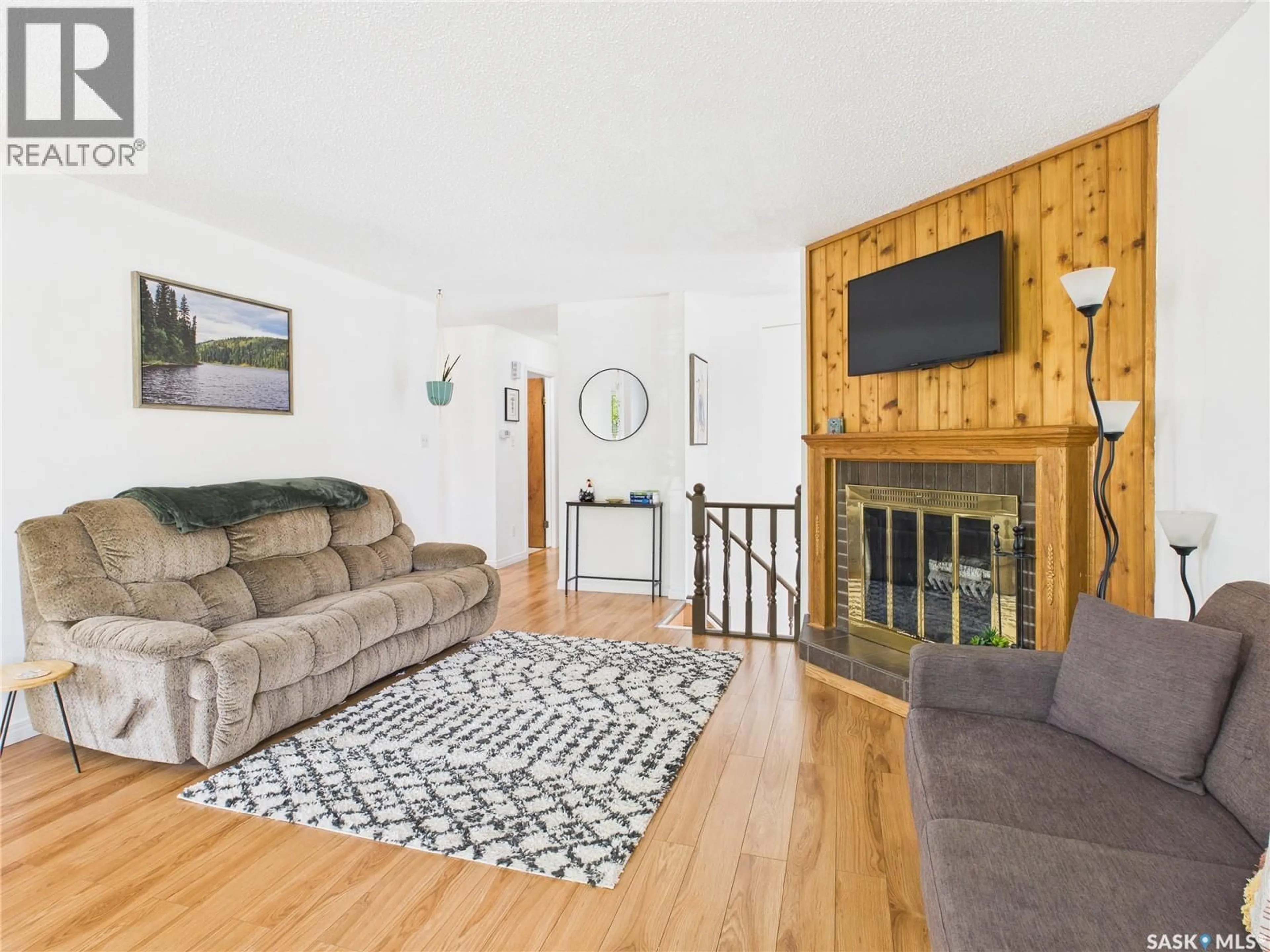 Living room with furniture, wood/laminate floor for 842 SPENCER DRIVE, Prince Albert Saskatchewan S6V7C9