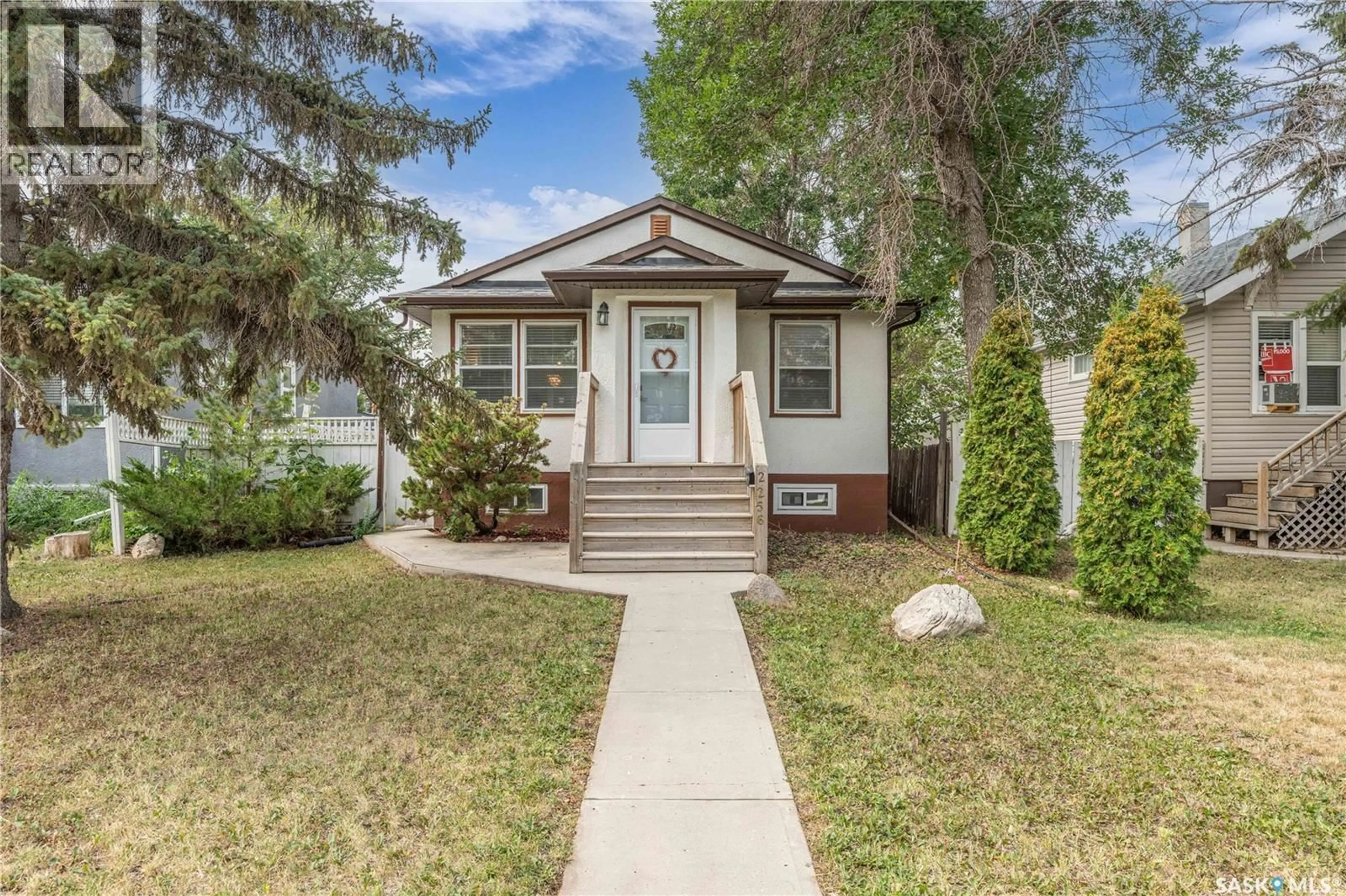 Home with vinyl exterior material, street for 2256 EDGAR STREET, Regina Saskatchewan S4N3K9