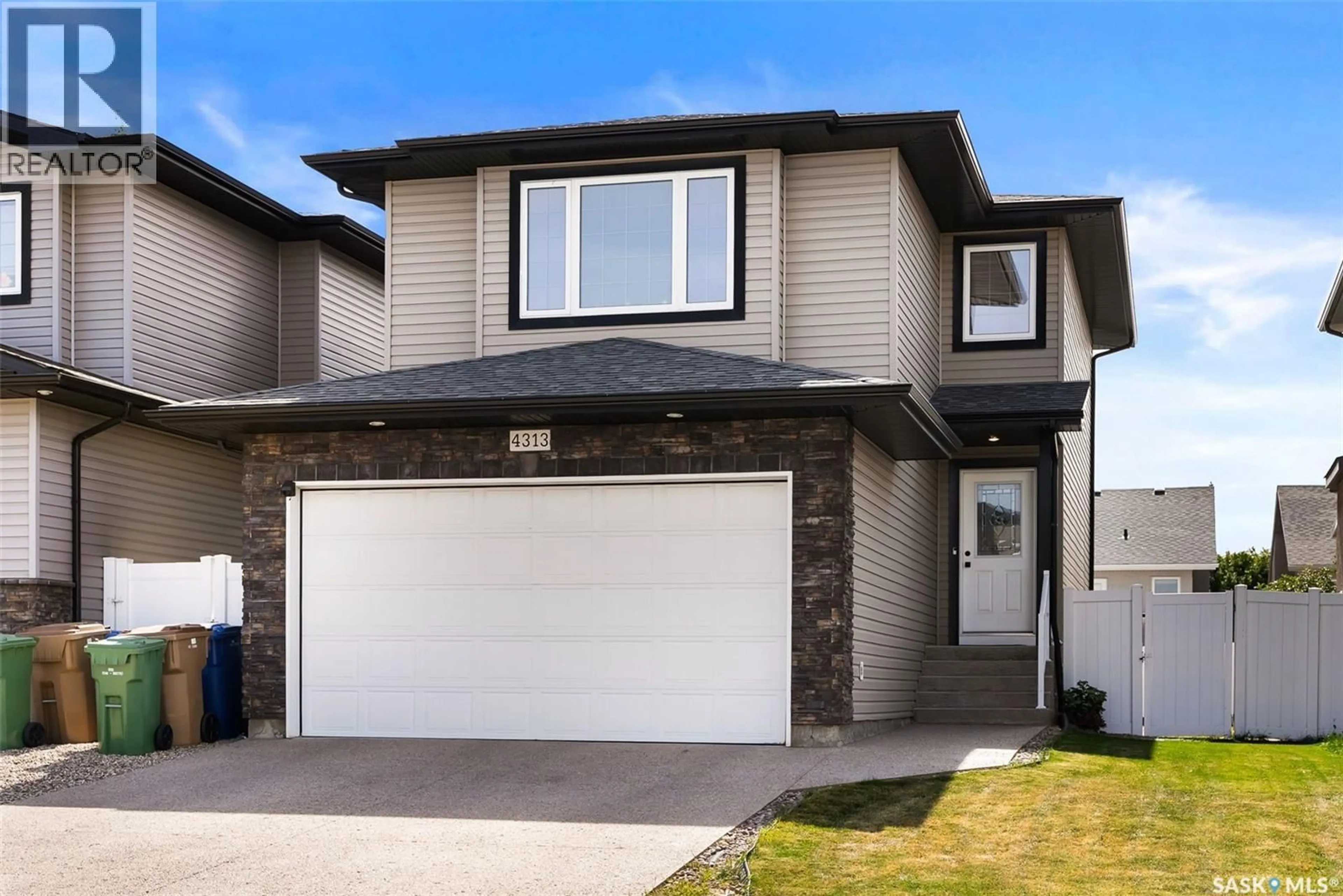Home with vinyl exterior material, street for 4313 MCMILLAN DRIVE, Regina Saskatchewan S4X0C6