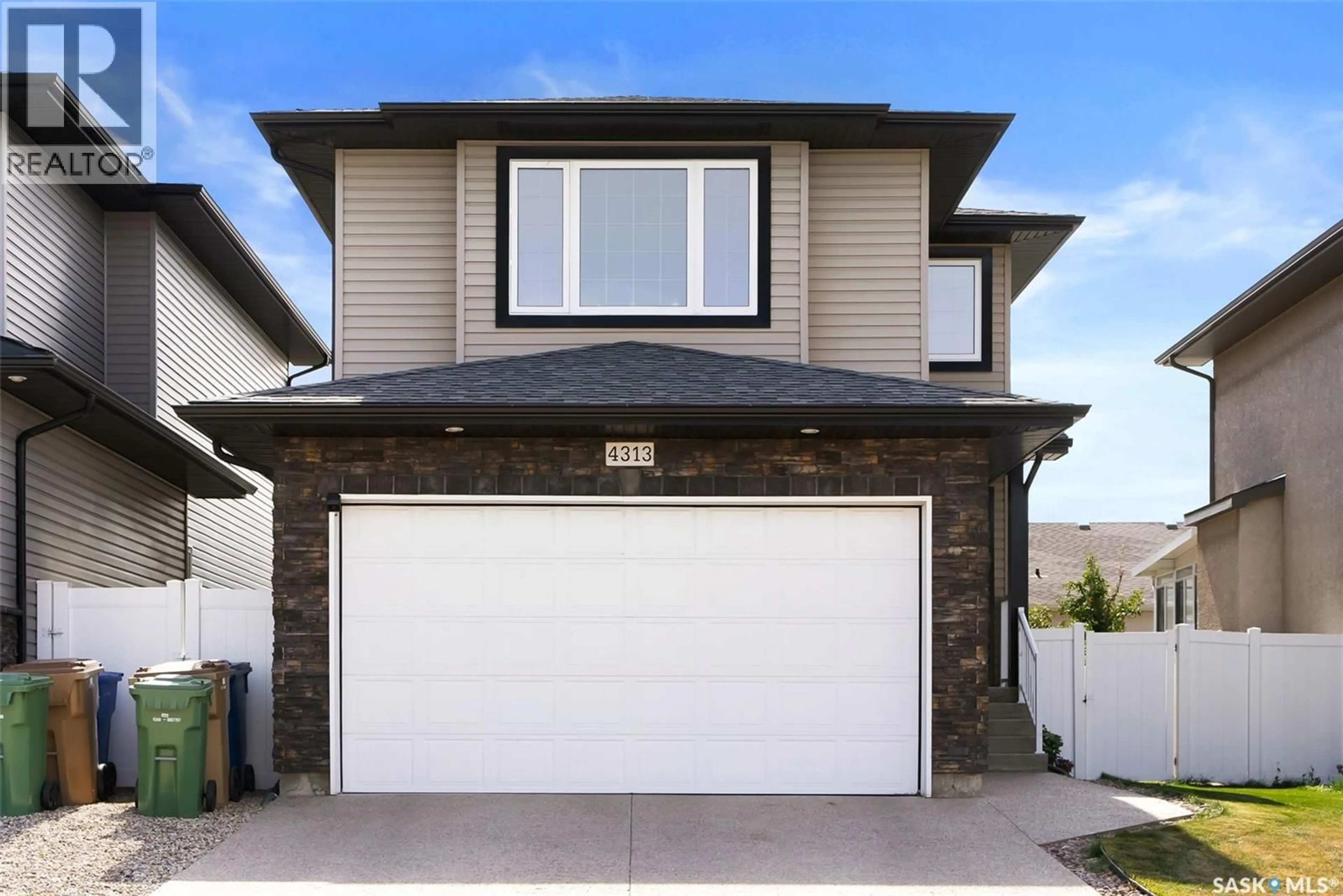 Home with vinyl exterior material, street for 4313 MCMILLAN DRIVE, Regina Saskatchewan S4X0C6