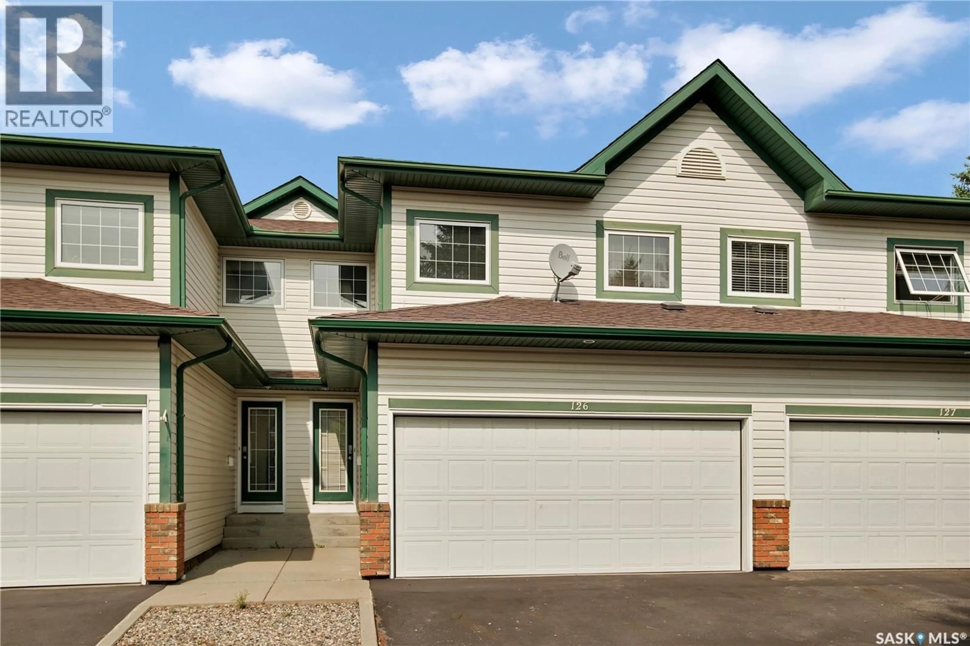 Home with vinyl exterior material, street for 515 - 126 MCWILLIE AVENUE, Saskatoon Saskatchewan S7S1K8