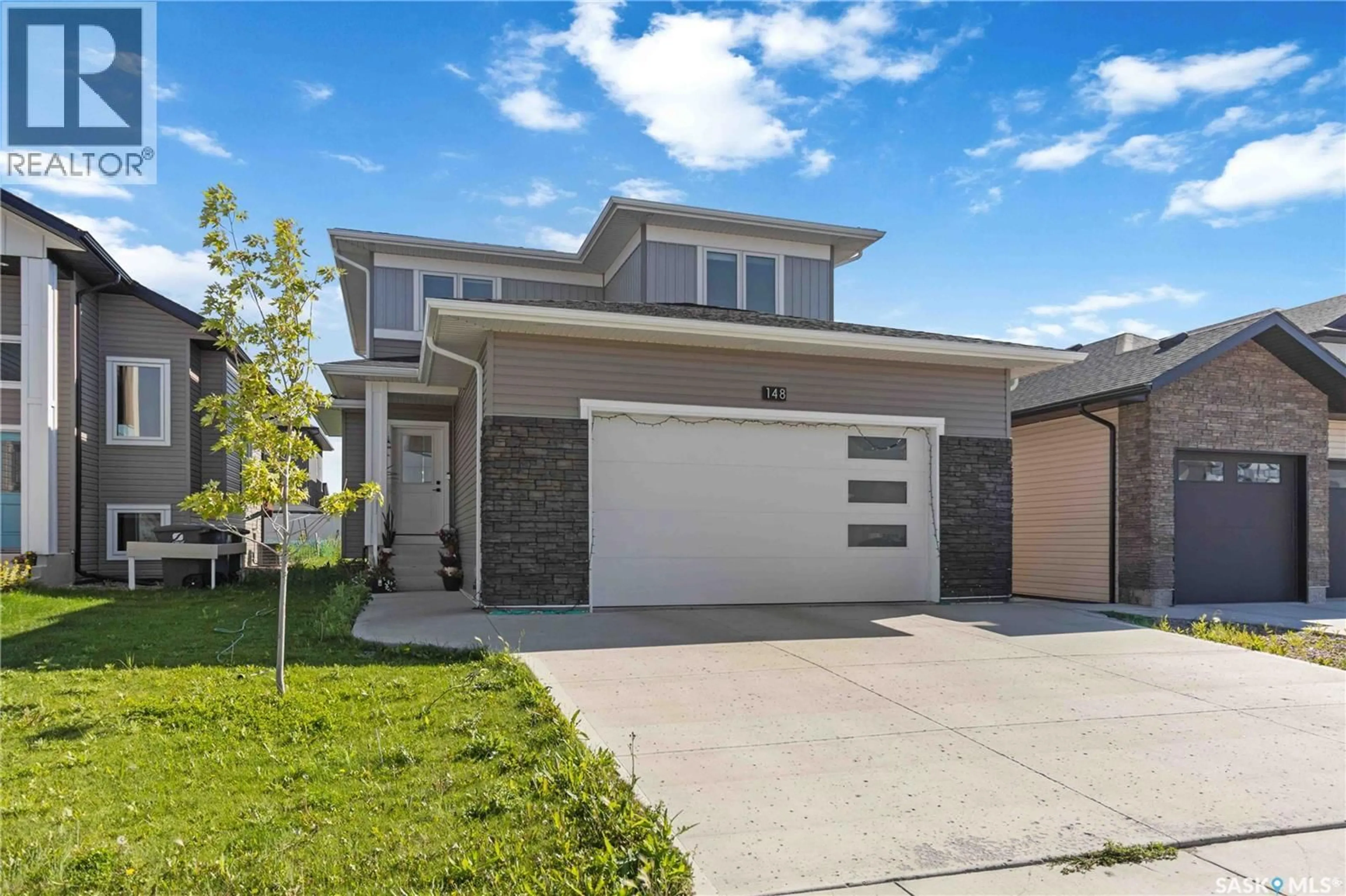 Home with brick exterior material, street for 148 BARRETT STREET, Saskatoon Saskatchewan S7W0Z7