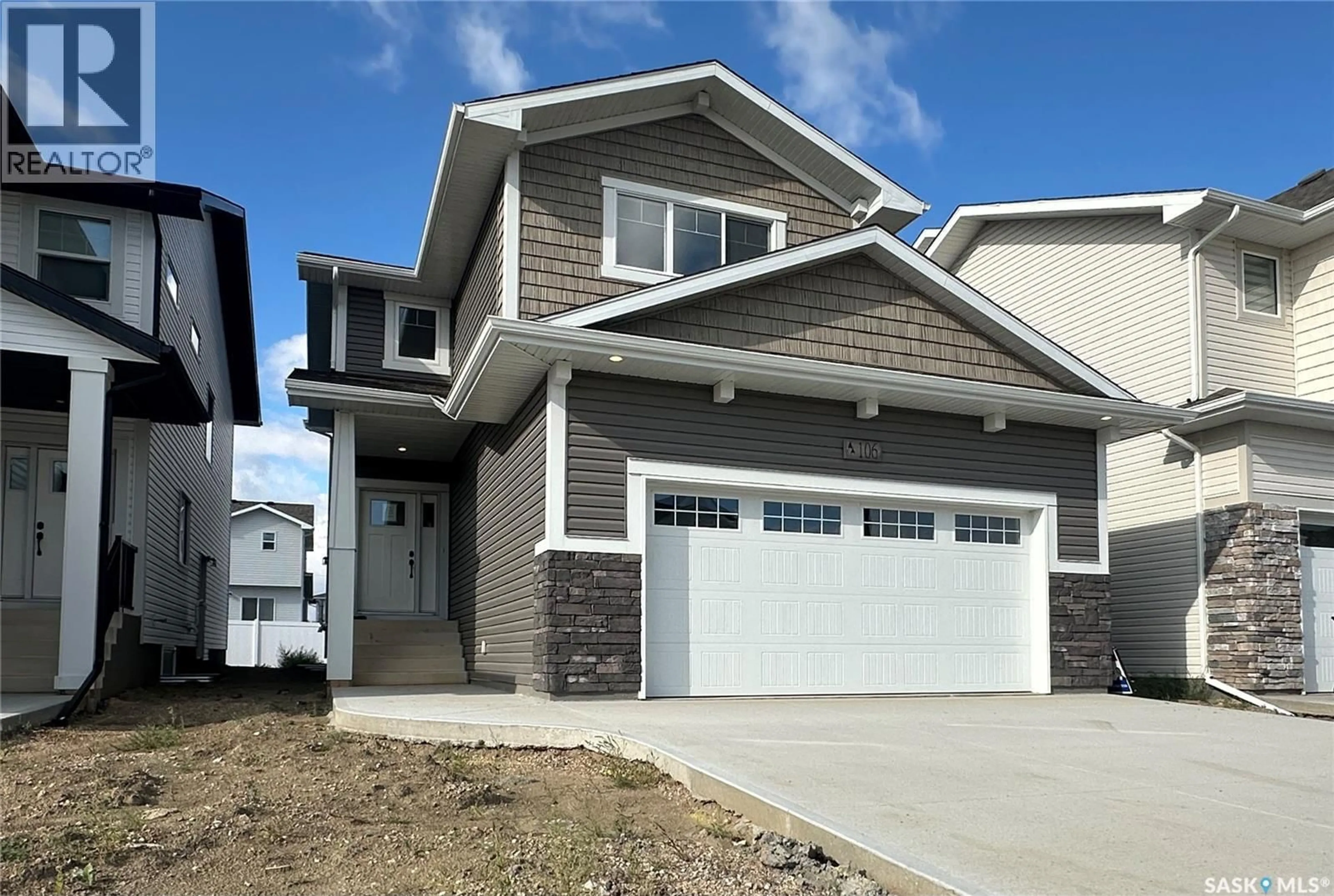 Home with vinyl exterior material, street for 106 KATZ AVENUE, Saskatoon Saskatchewan S7V1S9