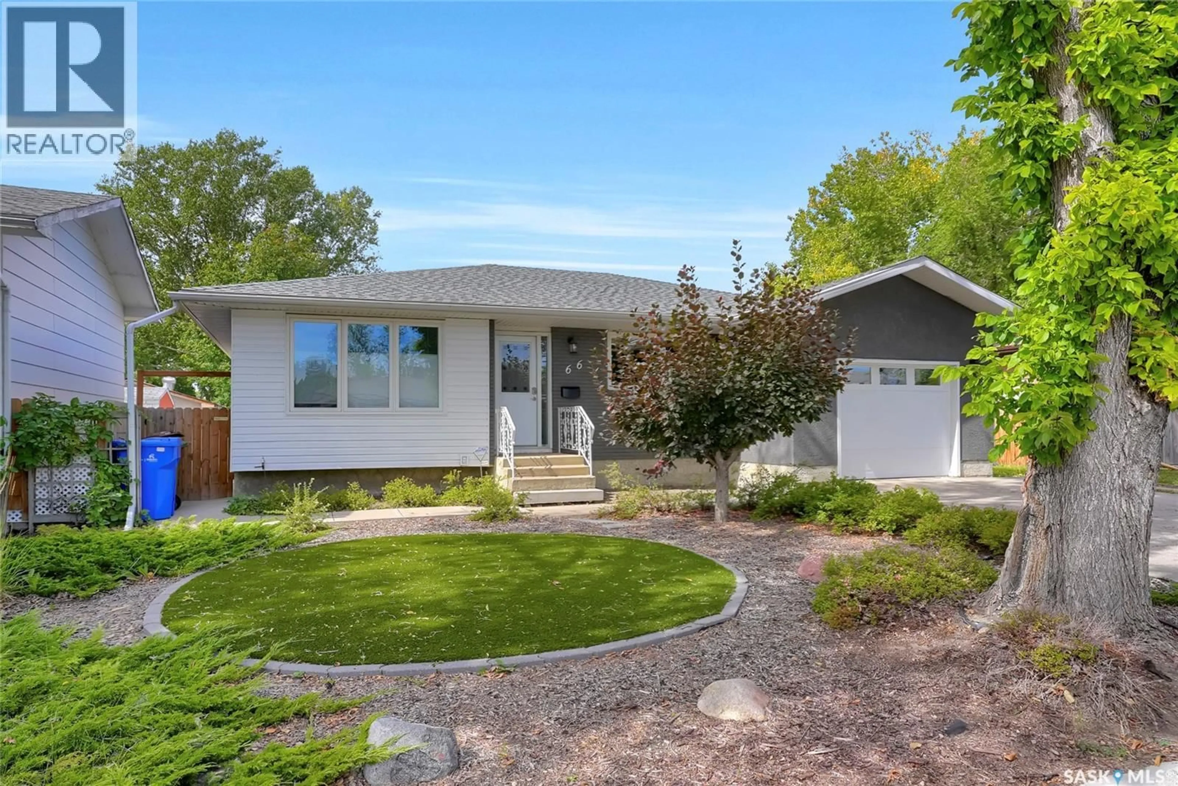 Home with vinyl exterior material, street for 66 KENNEDY CRESCENT, Regina Saskatchewan S4R6G4