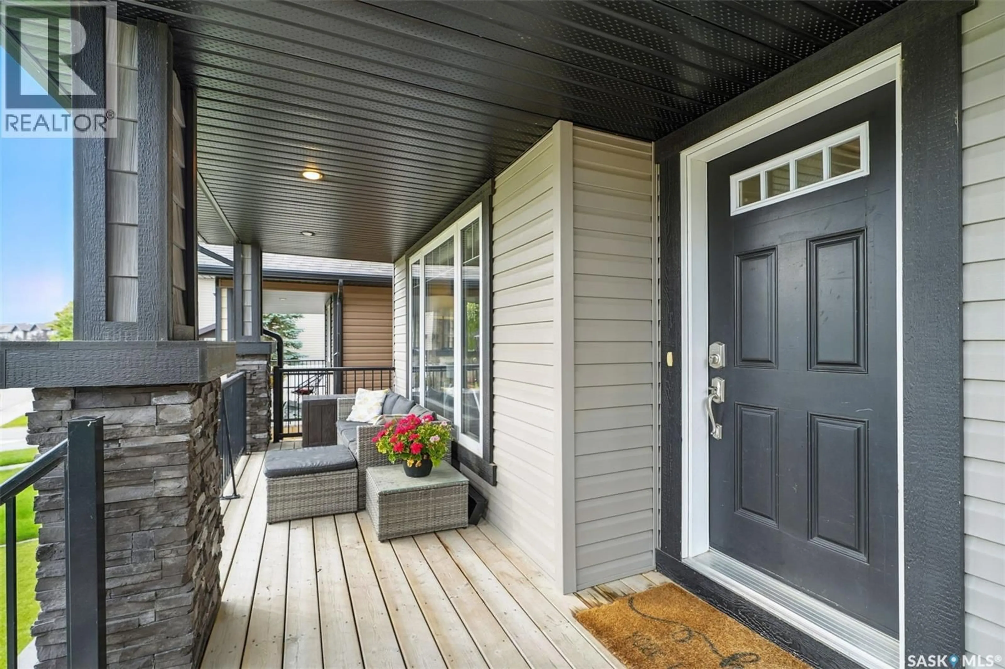 Home with vinyl exterior material, street for 126 LANGLOIS WAY, Saskatoon Saskatchewan S7T0N6