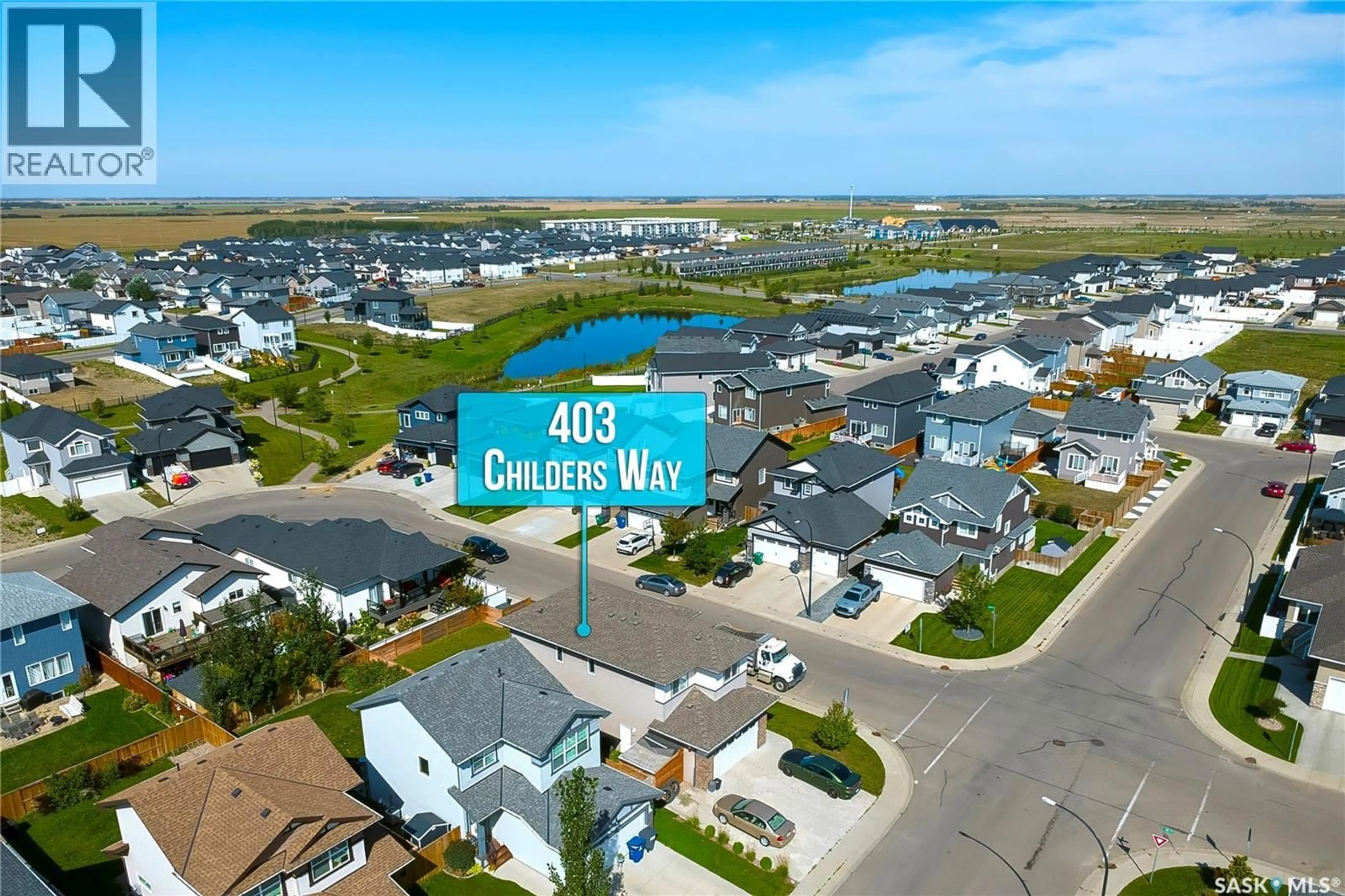 A pic from outside/outdoor area/front of a property/back of a property/a pic from drone, water/lake/river/ocean view for 403 CHILDERS WAY, Saskatoon Saskatchewan S7L4P2