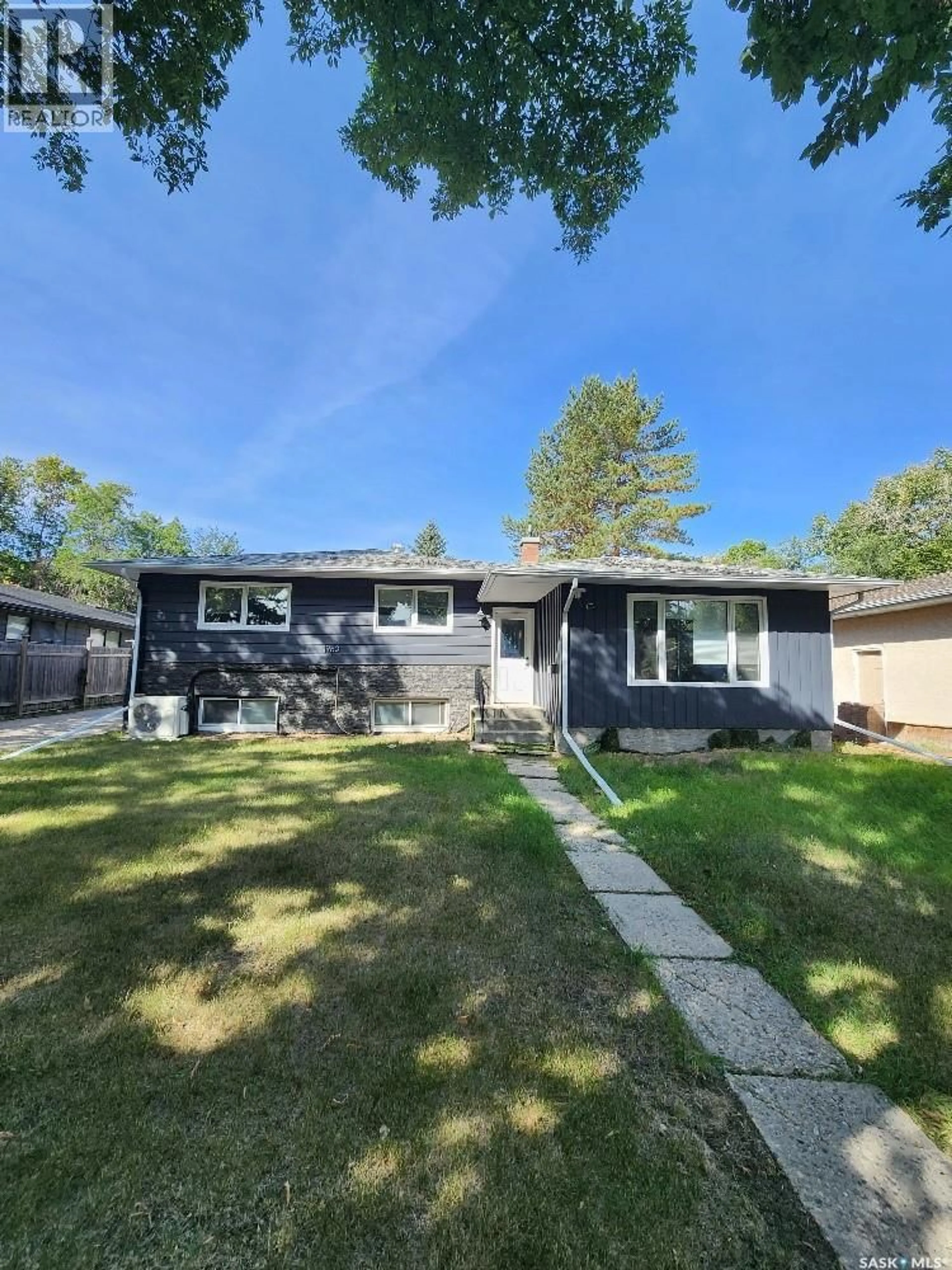 Home with vinyl exterior material, street for 1960 COWAN CRESCENT, Regina Saskatchewan S4S4C6