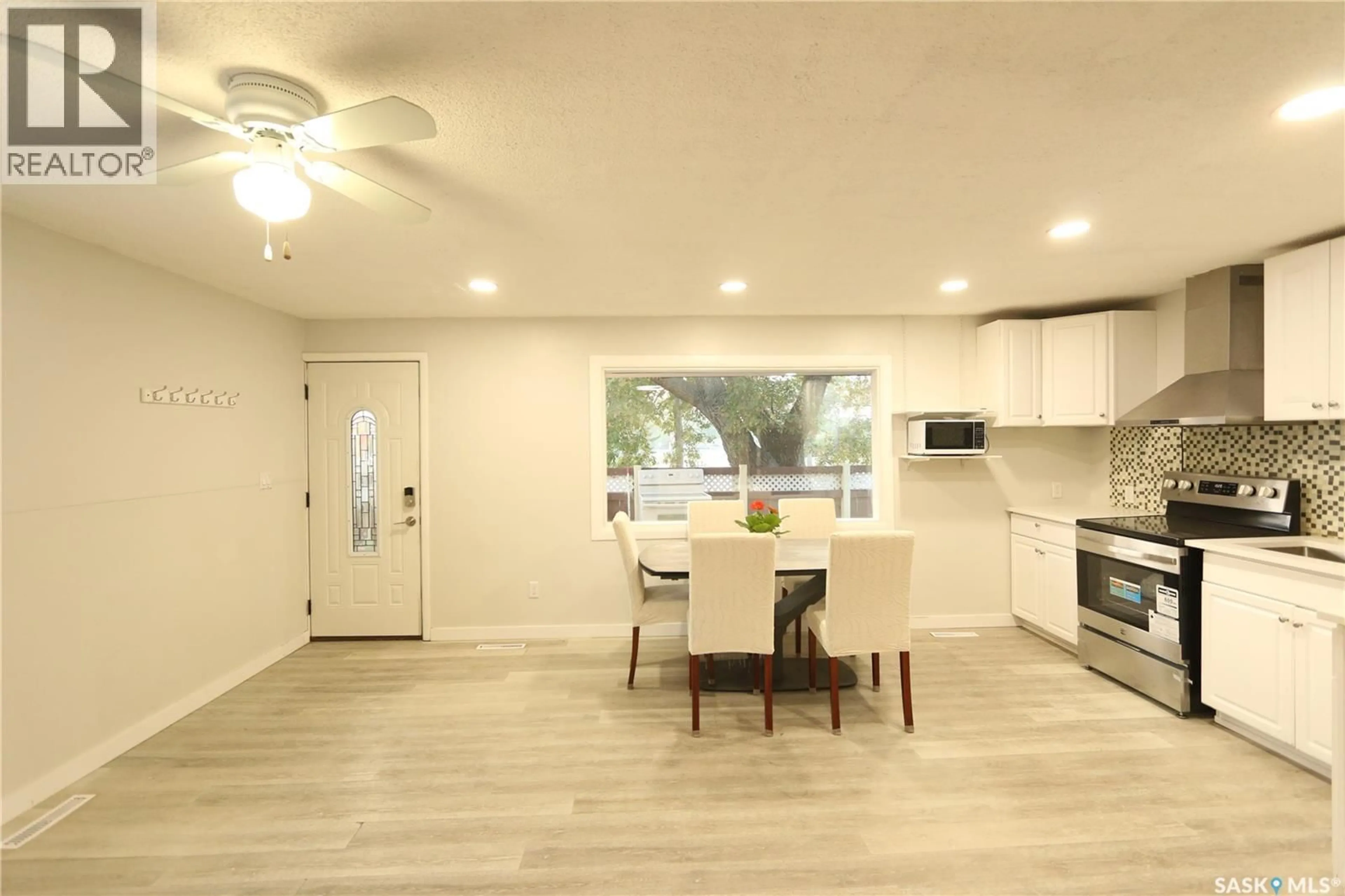Open concept kitchen, wood/laminate floor for 271 BROAD STREET, Regina Saskatchewan S4R1X1