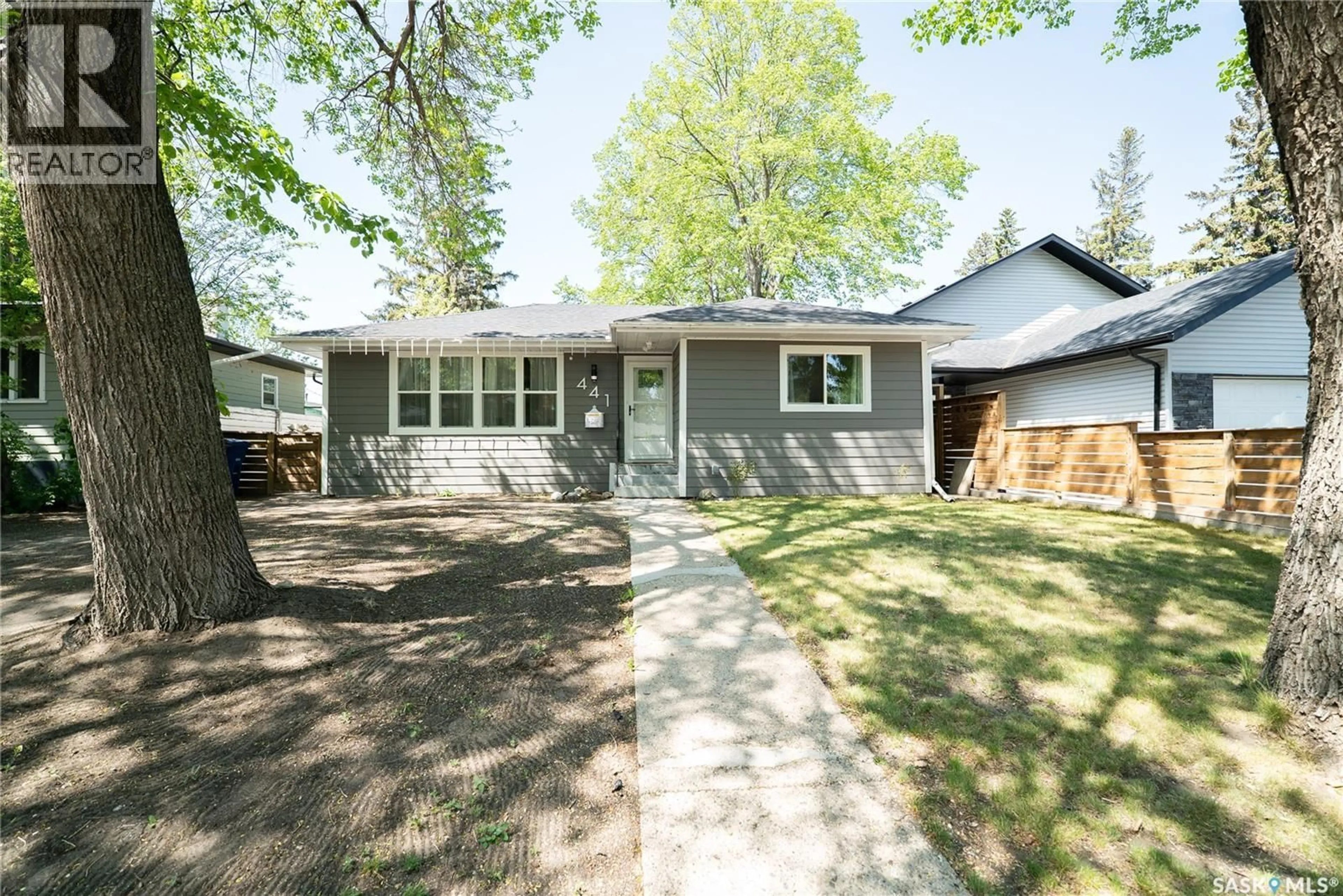 Home with vinyl exterior material, street for 441 Q AVENUE, Saskatoon Saskatchewan S7L2X9