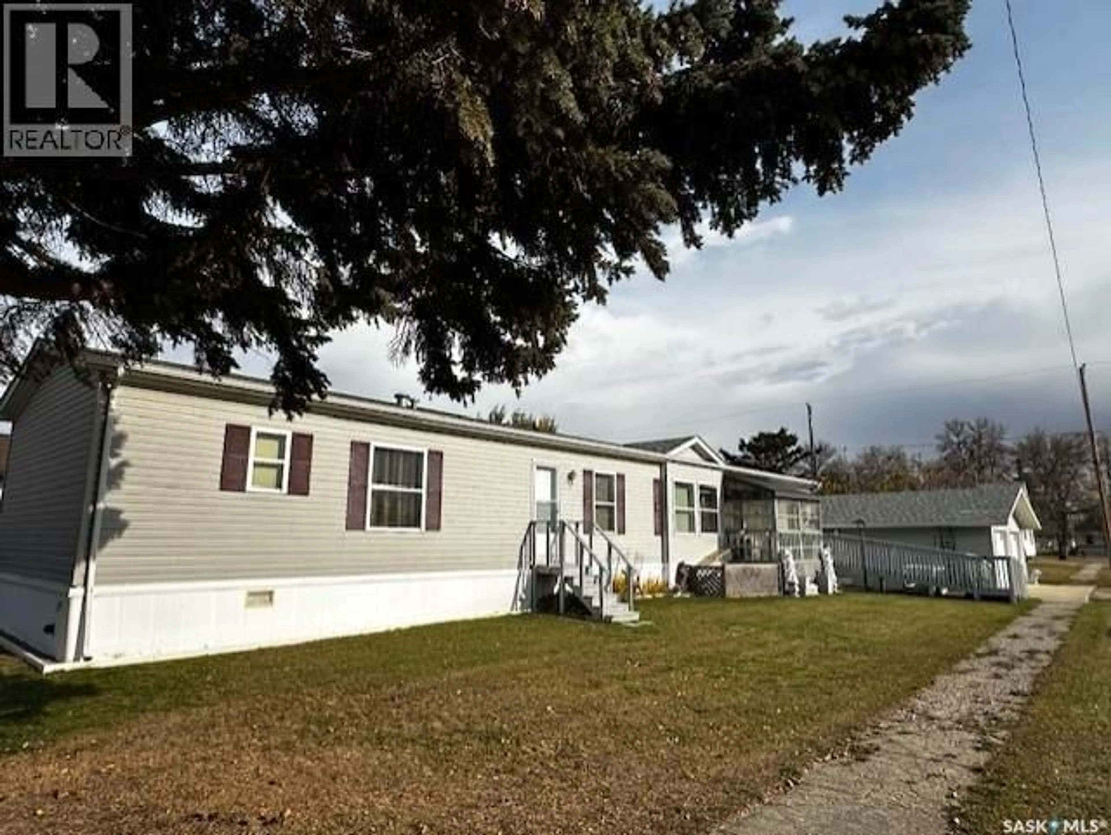 Home with vinyl exterior material, street for 215 LOUIS STREET, Neudorf Saskatchewan S0A2T0